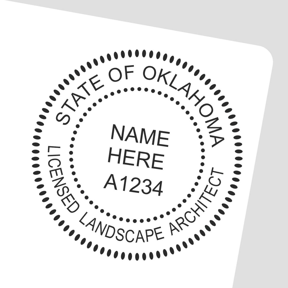 A lifestyle photo showing a stamped image of the Digital Oklahoma Landscape Architect Stamp on a piece of paper