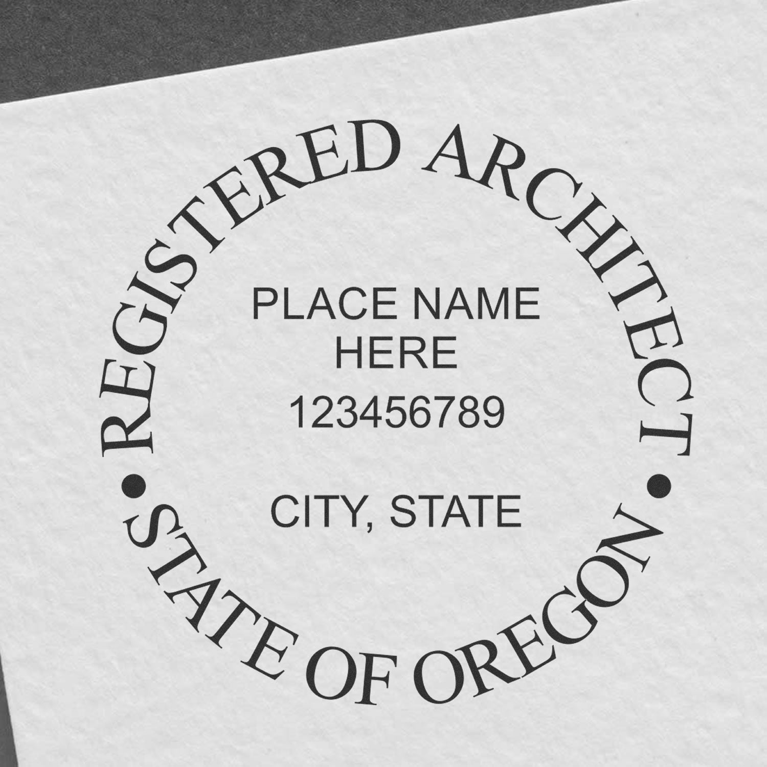 Self Inking Oregon Architect Stamp imprint on white paper, displaying Registered Architect, State of Oregon with customizable fields.