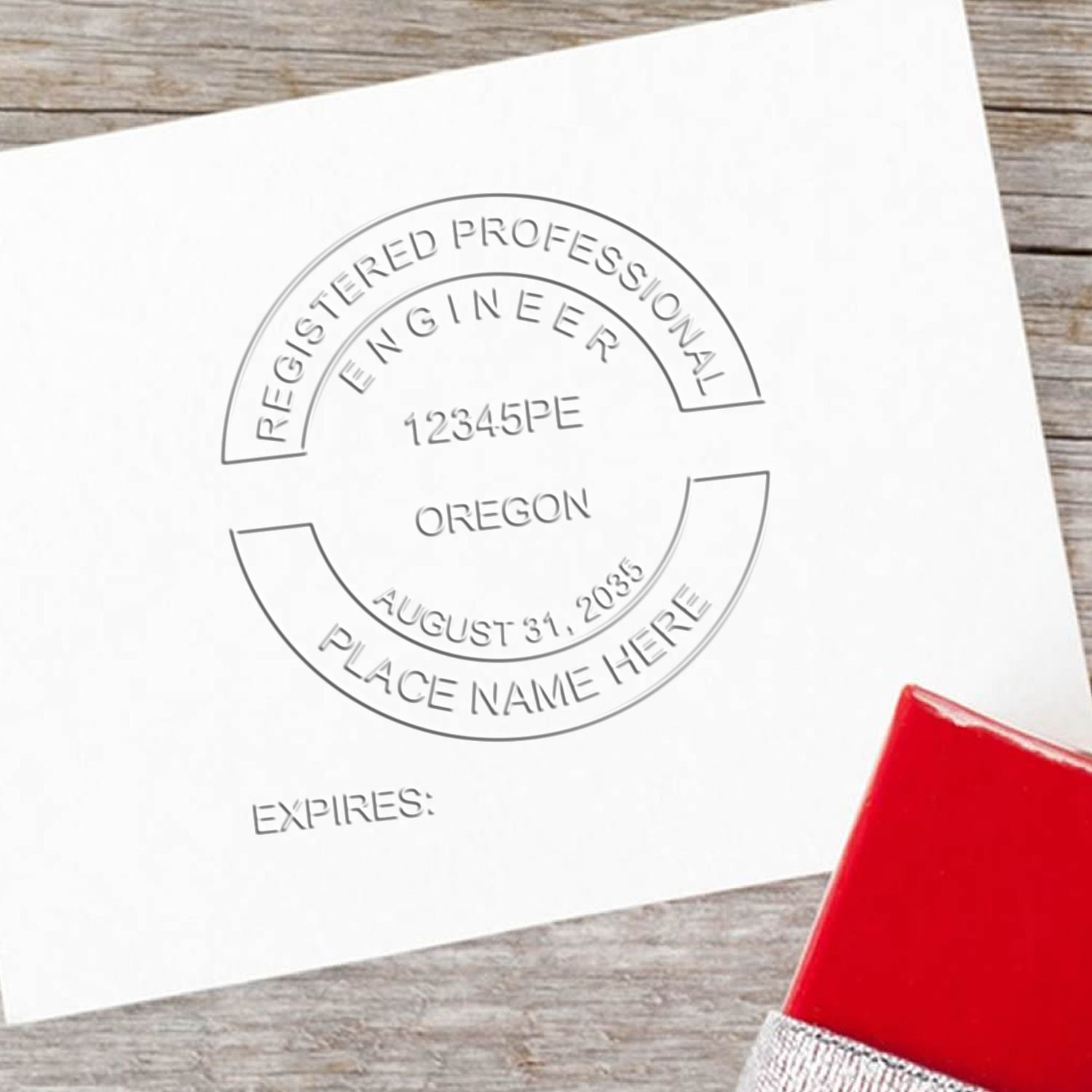 The Gift Oregon Engineer Seal stamp impression comes to life with a crisp, detailed image stamped on paper - showcasing true professional quality.