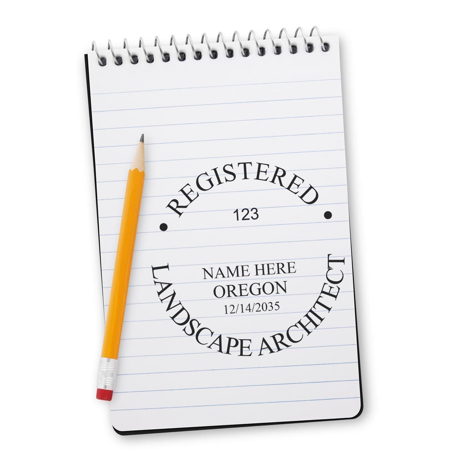 A lifestyle photo showing a stamped image of the Oregon Landscape Architectural Seal Stamp on a piece of paper