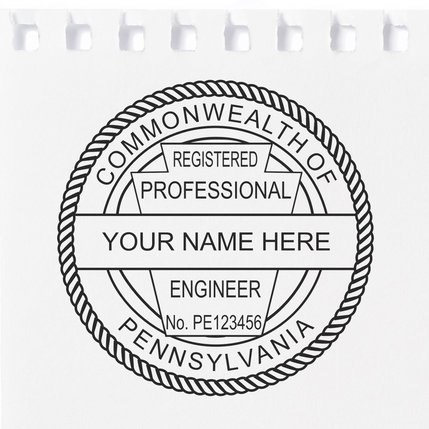 A lifestyle photo showing a stamped image of the Pennsylvania Professional Engineer Seal Stamp on a piece of paper