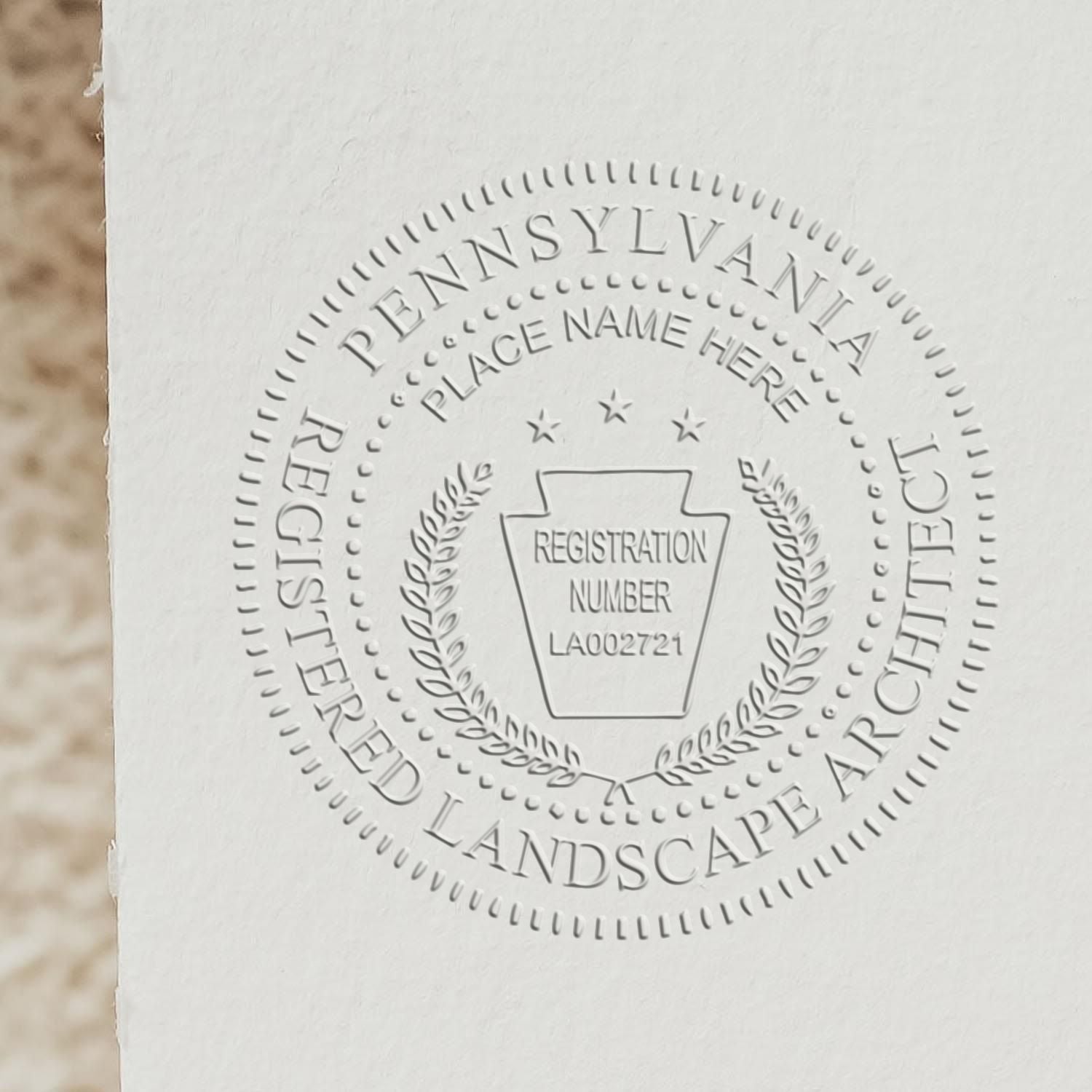 The Pennsylvania Desk Landscape Architectural Seal Embosser stamp impression comes to life with a crisp, detailed photo on paper - showcasing true professional quality.