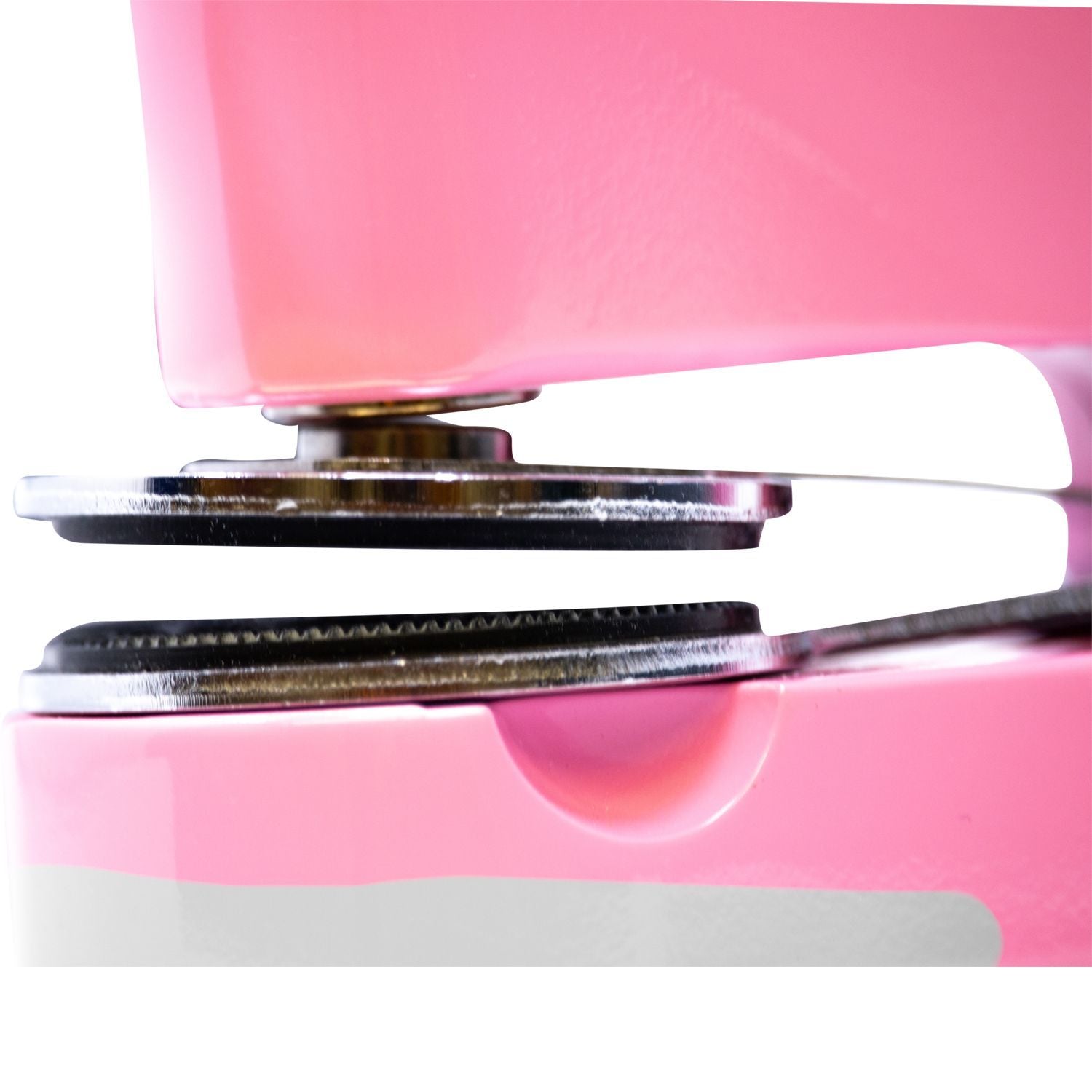 Close-up side view of the Professional Engineer Pink Gift Seal Embosser, showcasing its detailed embossing mechanism and vibrant pink color.