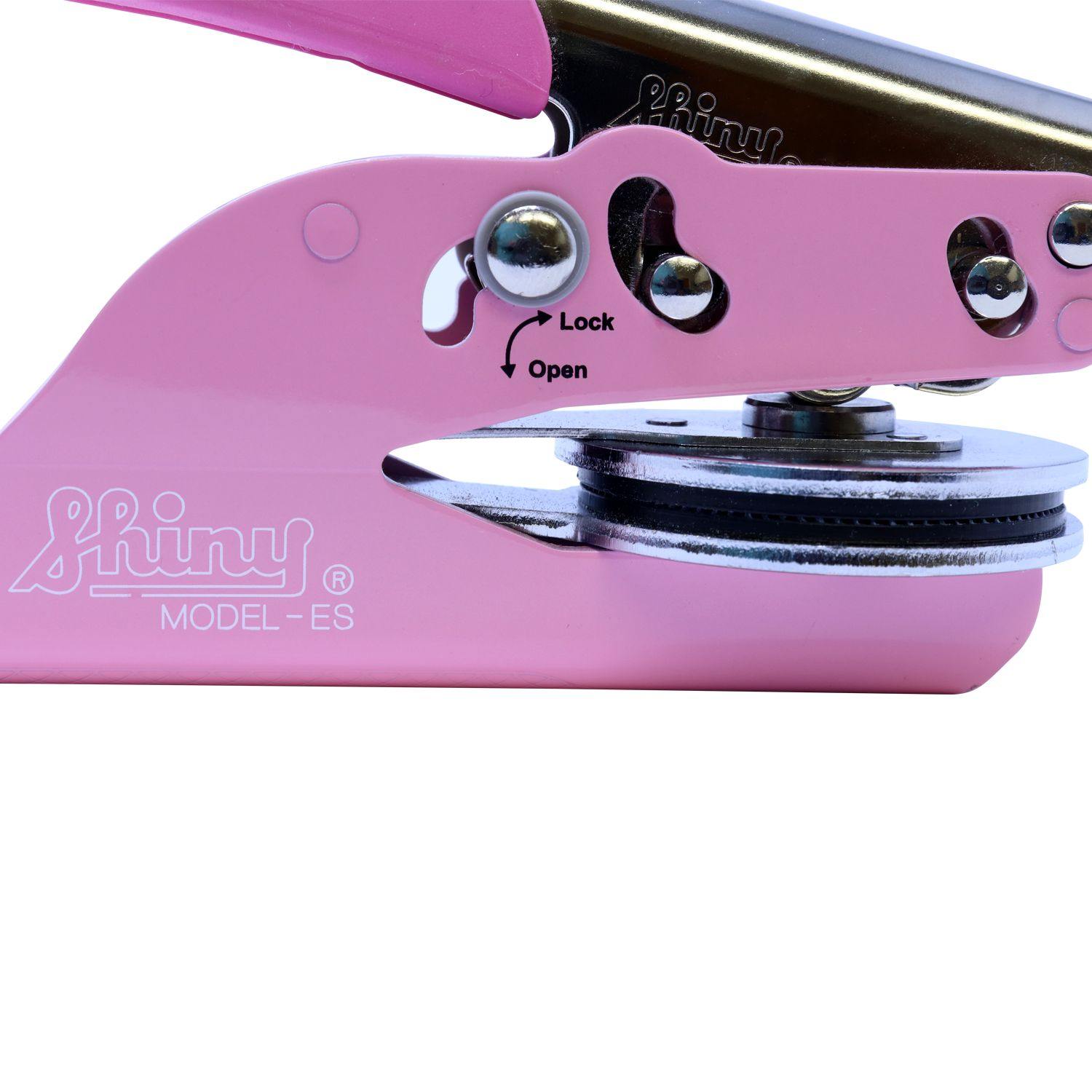 Real Estate Appraiser Pink Soft Seal Embosser in locked position, close-up view showing the shiny metal parts and lock mechanism.