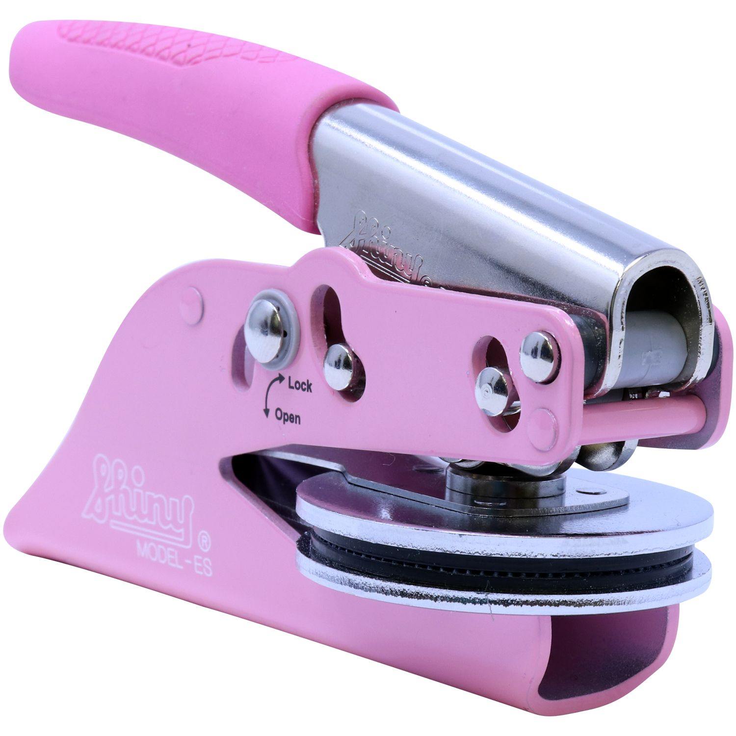 Land Surveyor Pink Soft Seal Embosser with a sleek pink handle and metallic components, shown from a side angle.