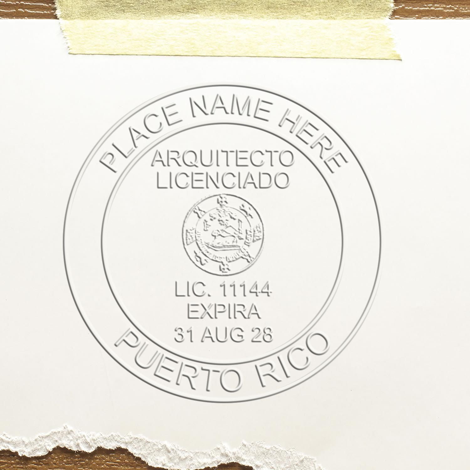 A stamped impression of the Handheld Puerto Rico Architect Seal Embosser in this stylish lifestyle photo, setting the tone for a unique and personalized product.