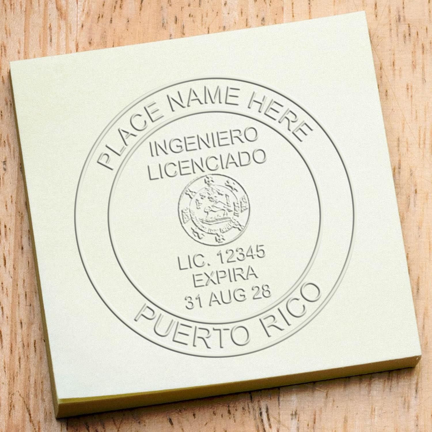 An alternative view of the Heavy Duty Cast Iron Puerto Rico Engineer Seal Embosser stamped on a sheet of paper showing the image in use