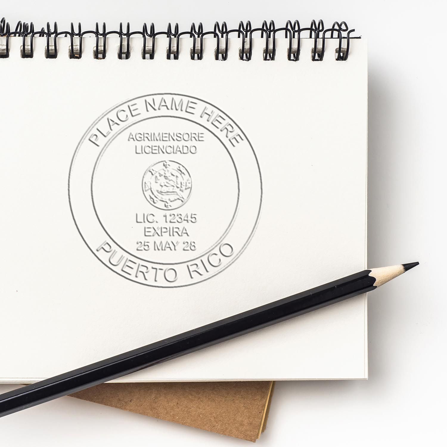 Another Example of a stamped impression of the State of Puerto Rico Soft Land Surveyor Embossing Seal on a piece of office paper.