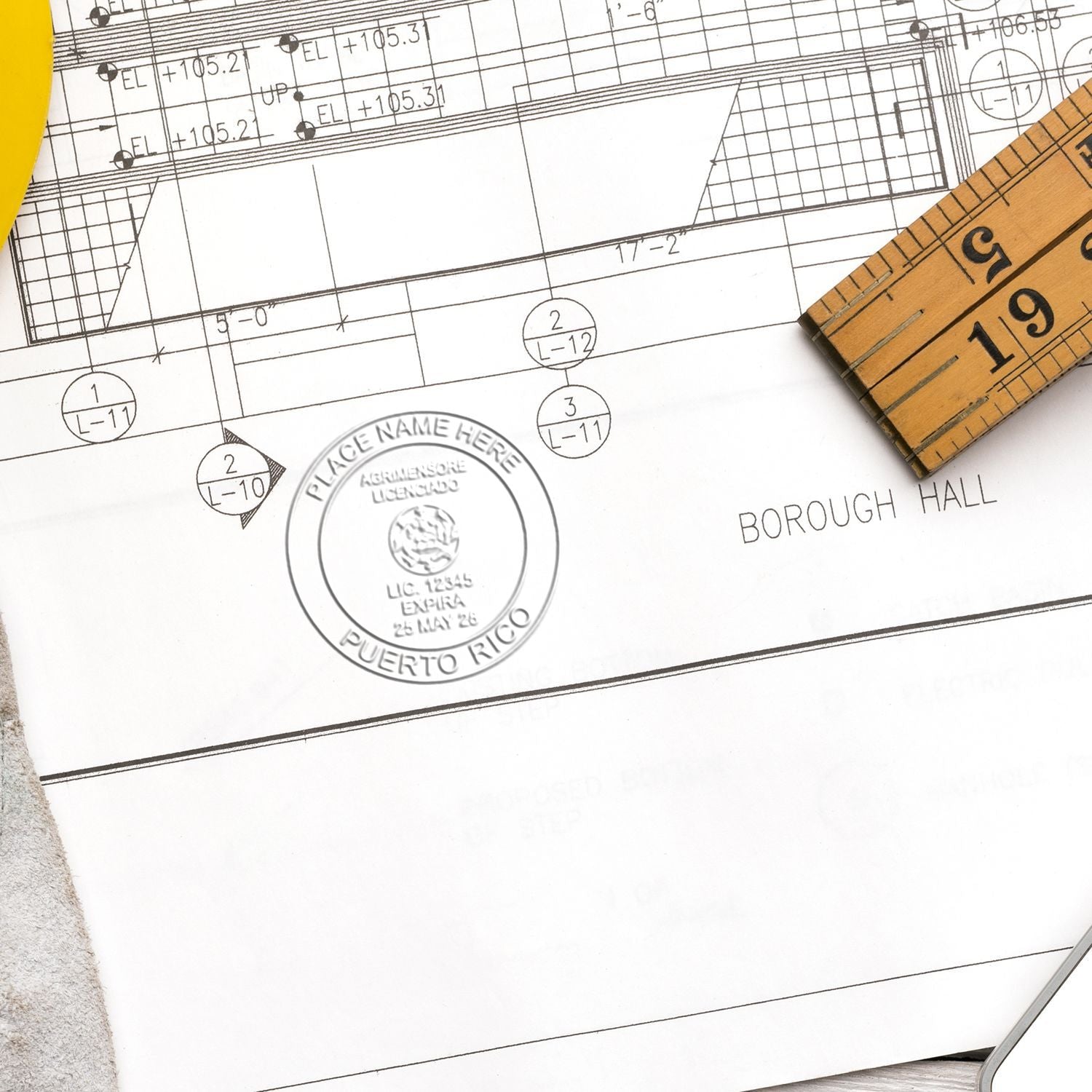 Another Example of a stamped impression of the Handheld Puerto Rico Land Surveyor Seal on a piece of office paper.