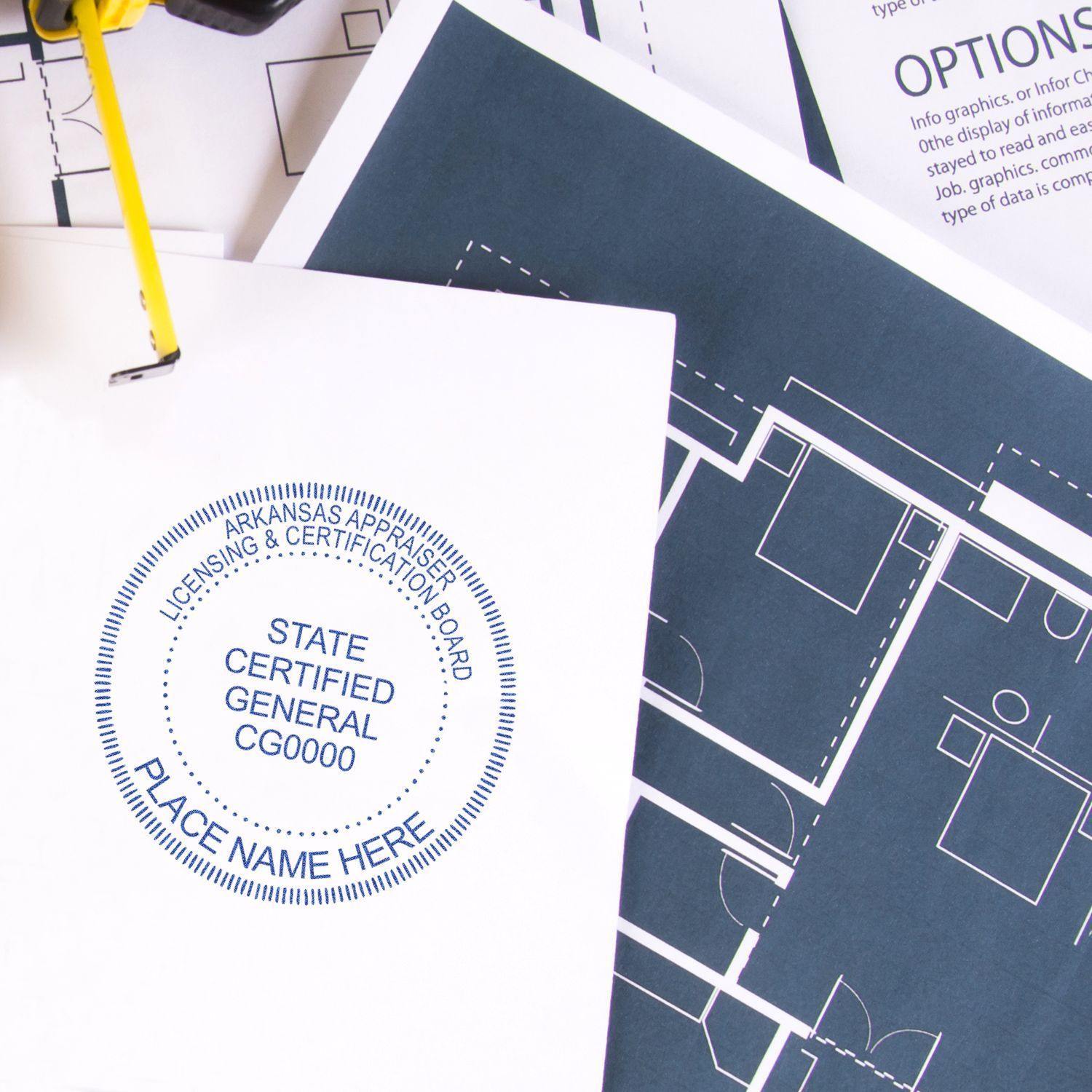 Real Estate Appraiser Regular Rubber Stamp of Seal used on a document, with architectural blueprints and a yellow pen in the background.