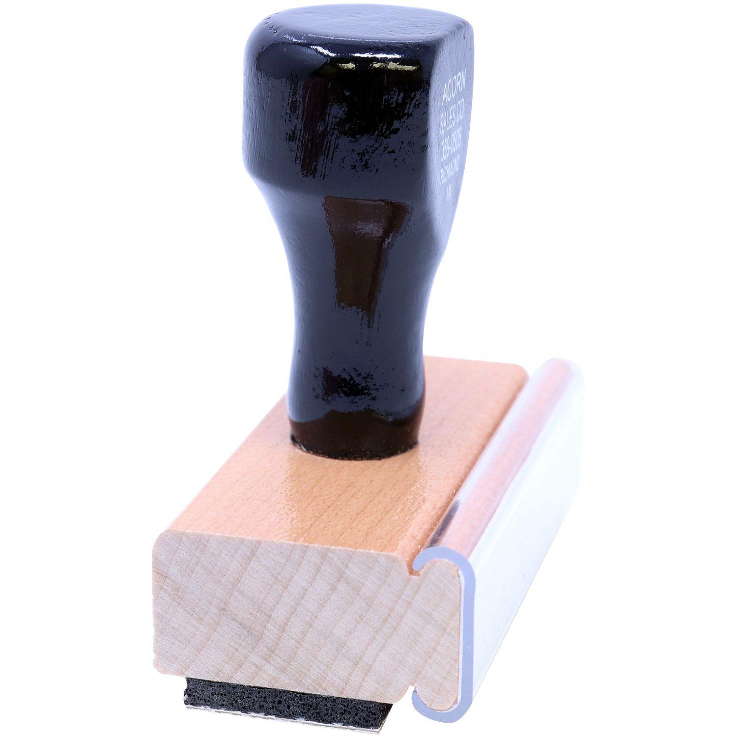 Wooden handle Two Line Faxed Rubber Stamp with black grip, side angle view, showing the rubber stamping surface and wooden base.