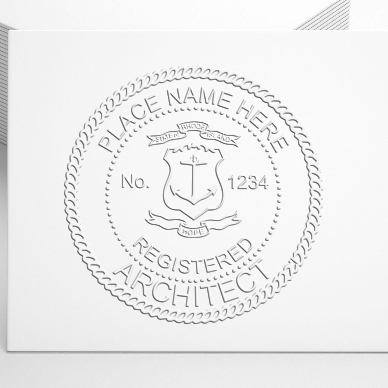 A lifestyle photo showing a stamped image of the Rhode Island Desk Architect Embossing Seal on a piece of paper