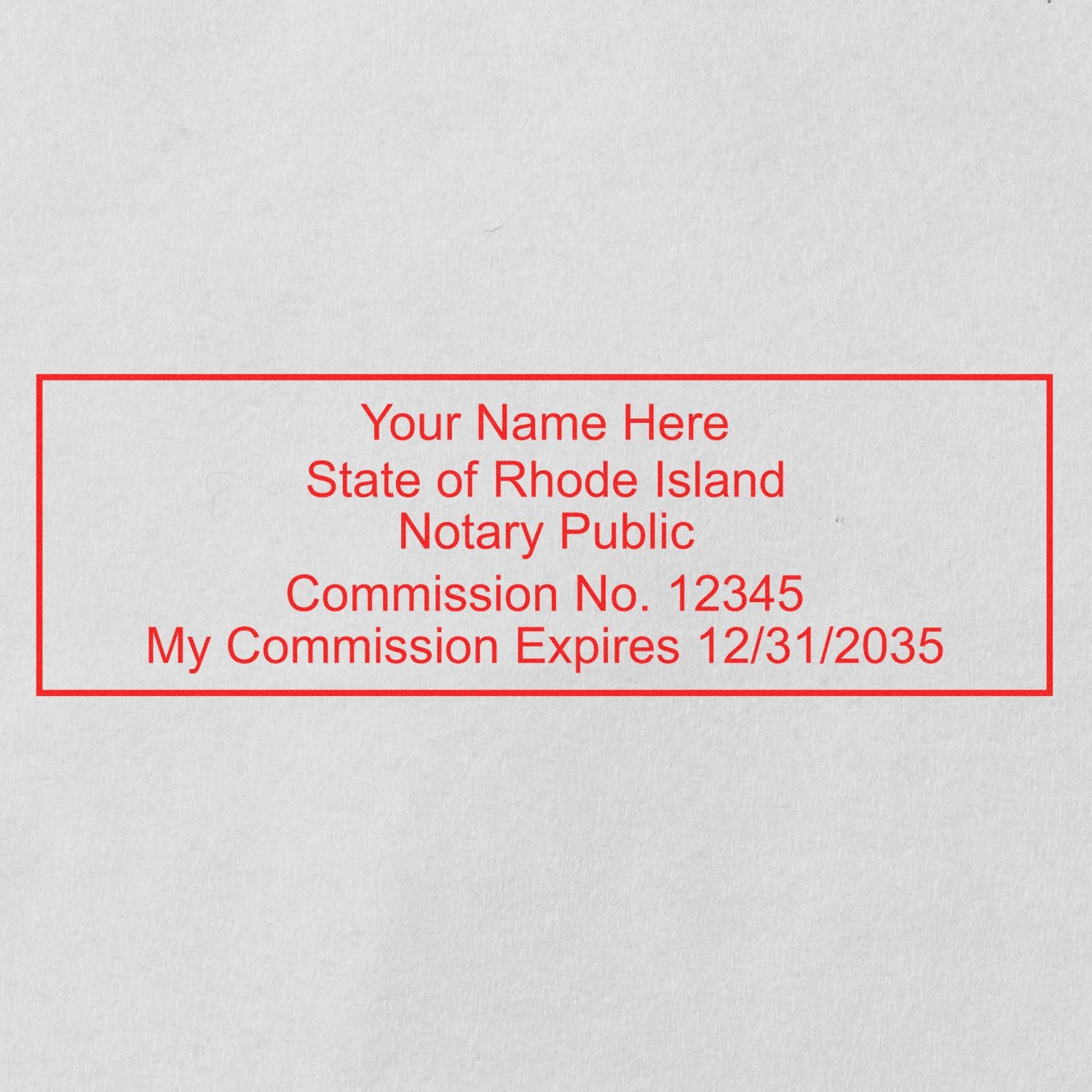 The Self-Inking Rectangular Rhode Island Notary Stamp stamp impression comes to life with a crisp, detailed photo on paper - showcasing true professional quality.