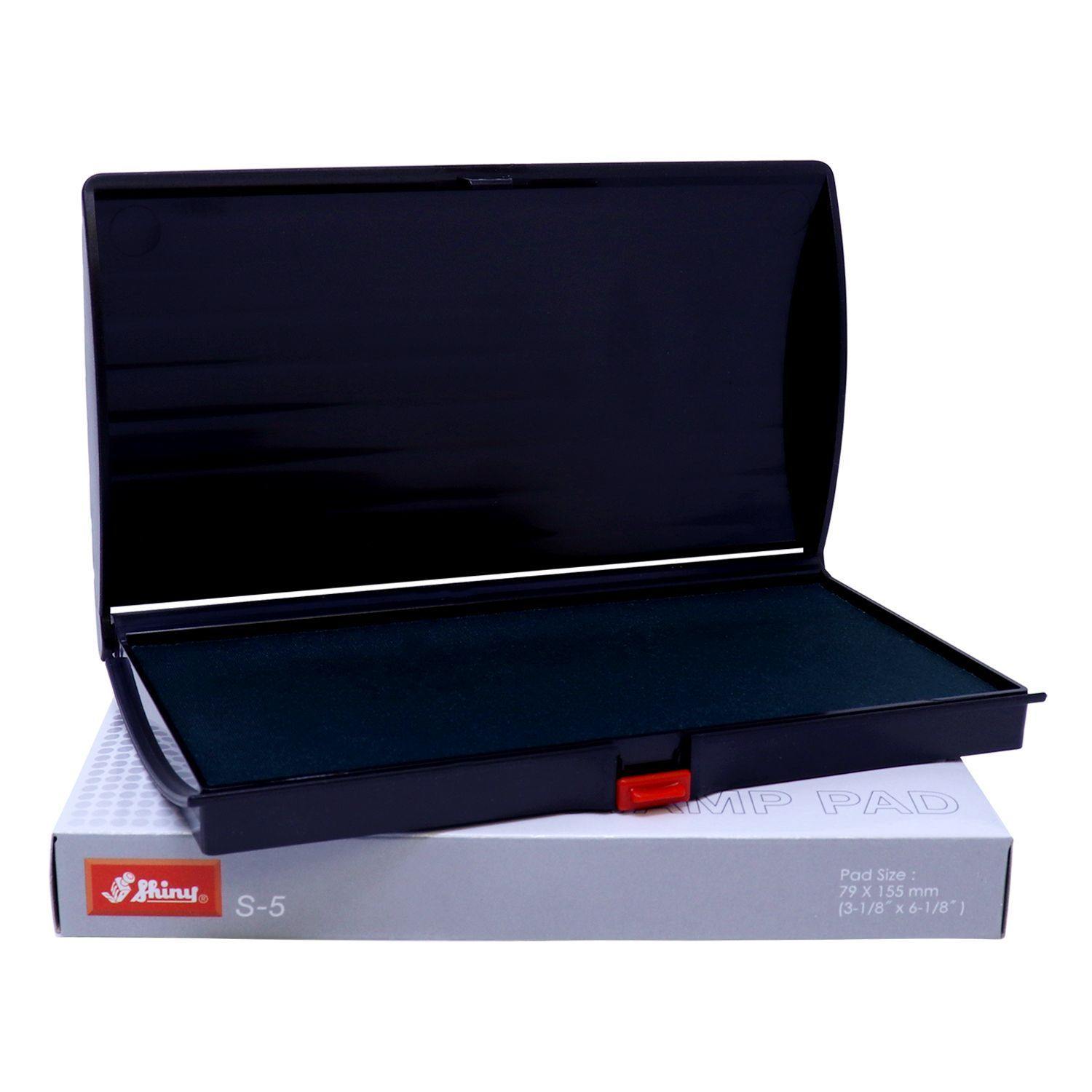 Open Rubber Stamp Ink Pad 2 Size 3-1/4 x 6-1/4 in black, placed on its packaging box with a red latch visible.