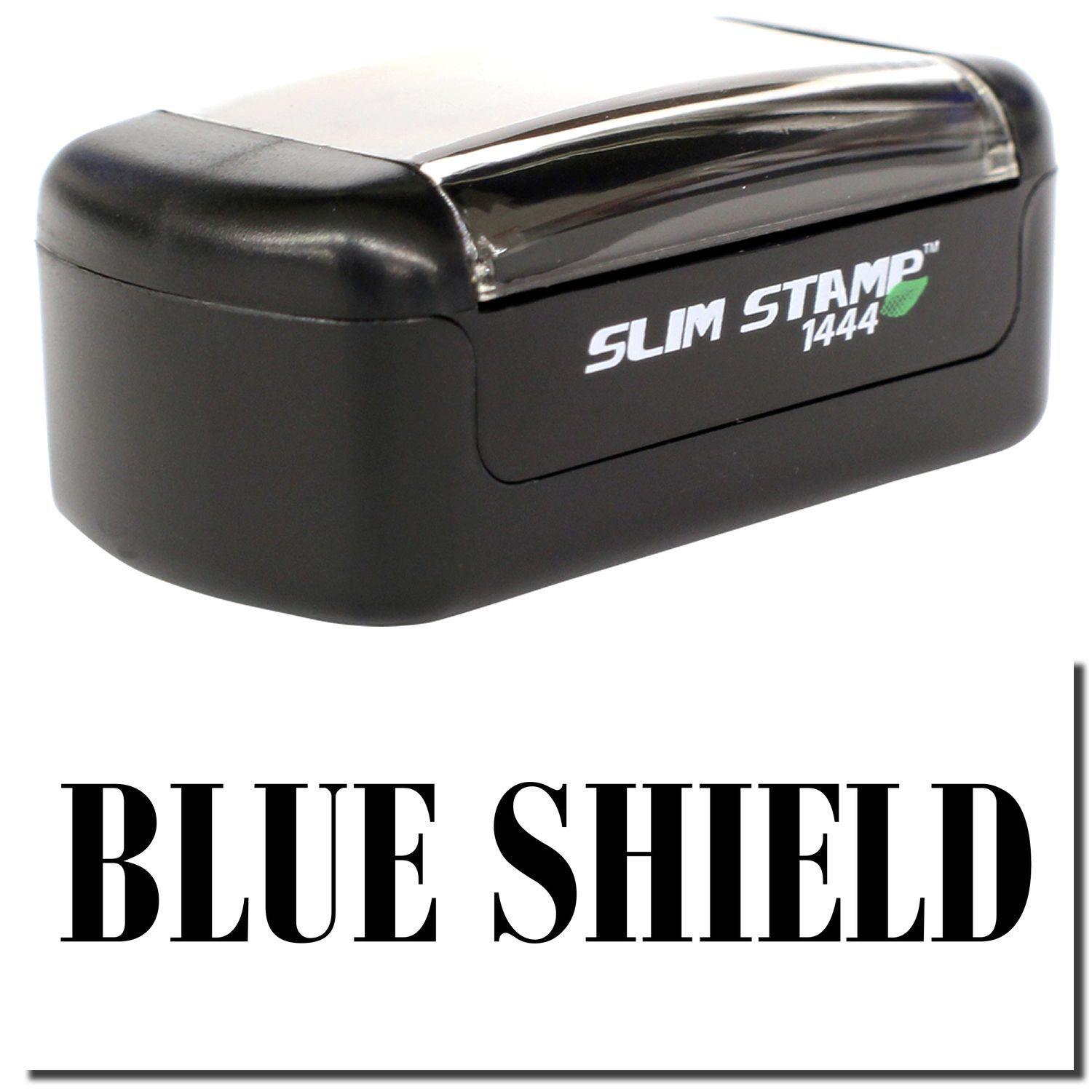 A stock office pre-inked stamp with a stamped image showing how the text BLUE SHIELD is displayed after stamping.