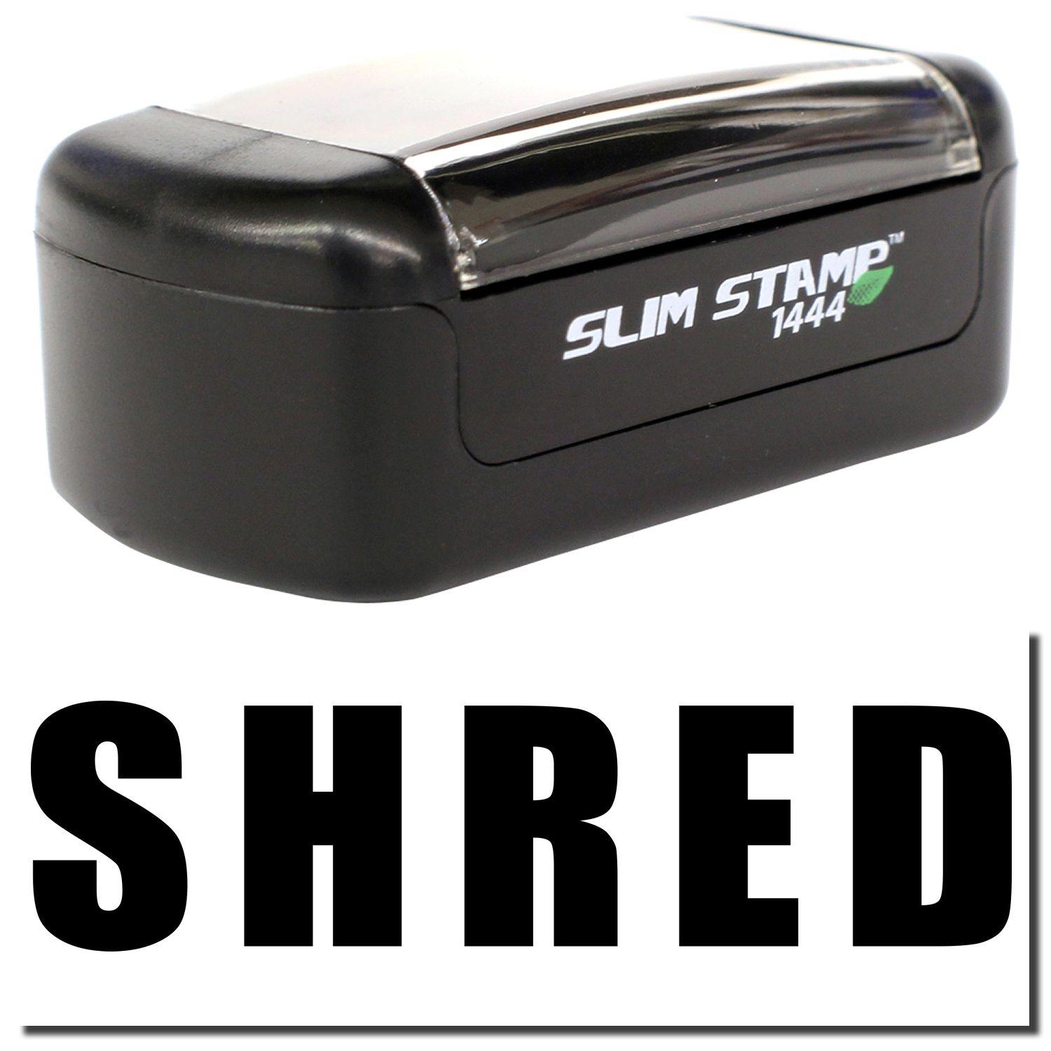 A stock office pre-inked stamp with a stamped image showing how the text SHRED in bold font is displayed after stamping.