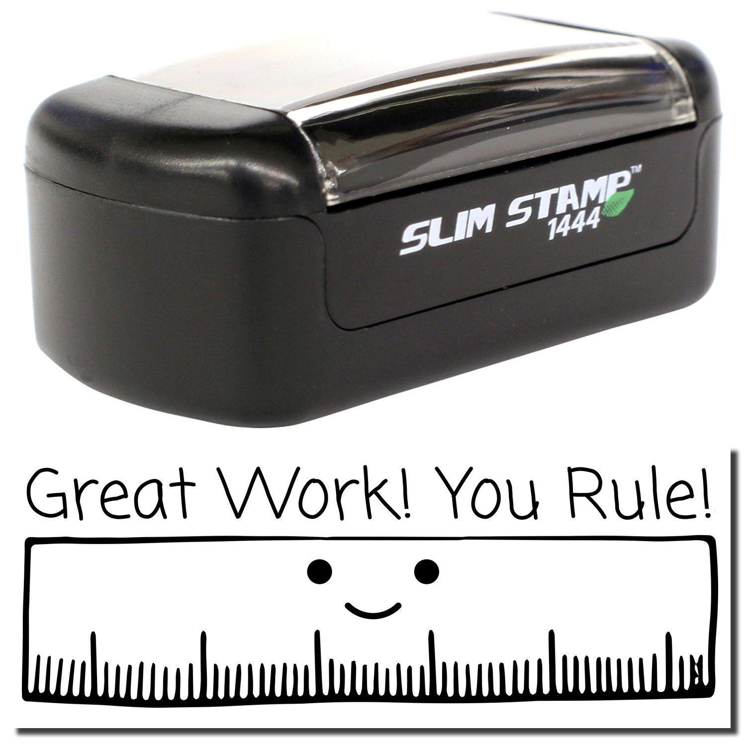 A stock office pre-inked stamp with a stamped image showing how the text Great Work! You Rule! with a large image of a ruler with a smiling face is displayed after stamping.