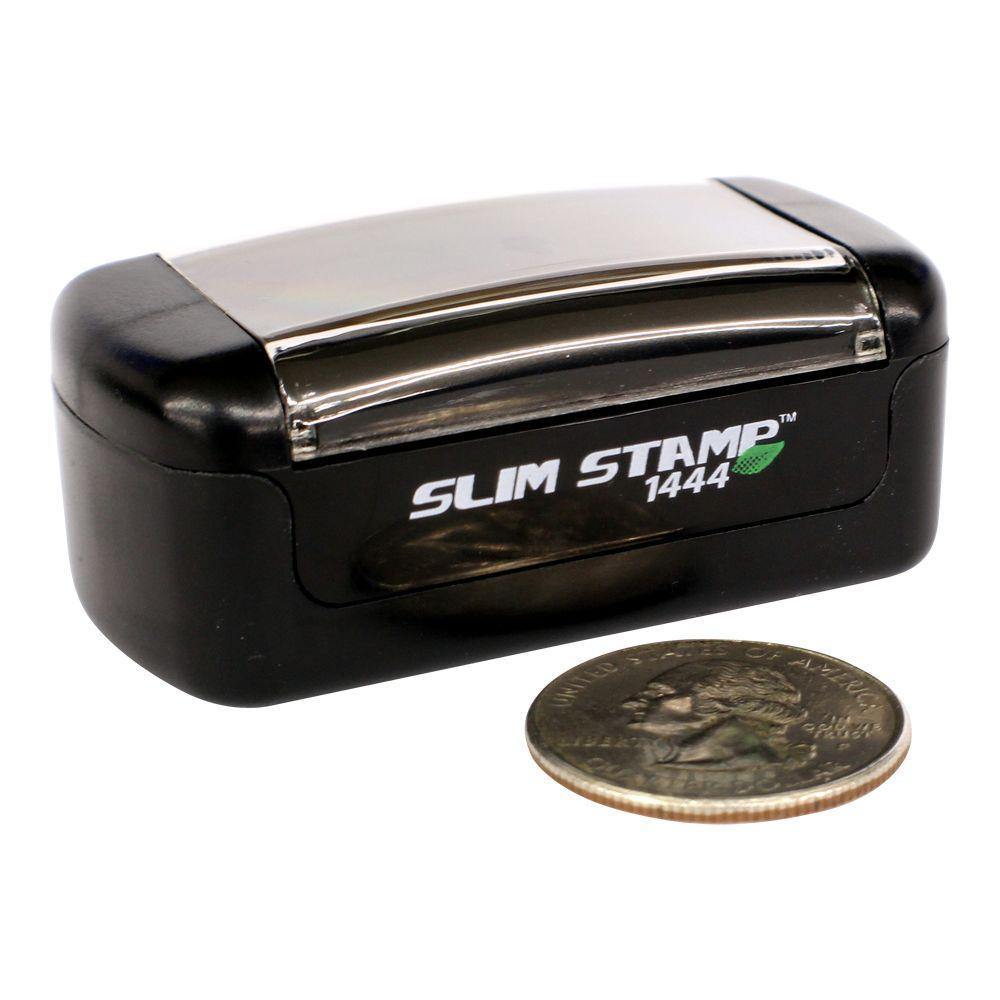 Slim Pre-Inked Medical Alert Stamp next to a quarter for size comparison, showcasing its compact and portable design.