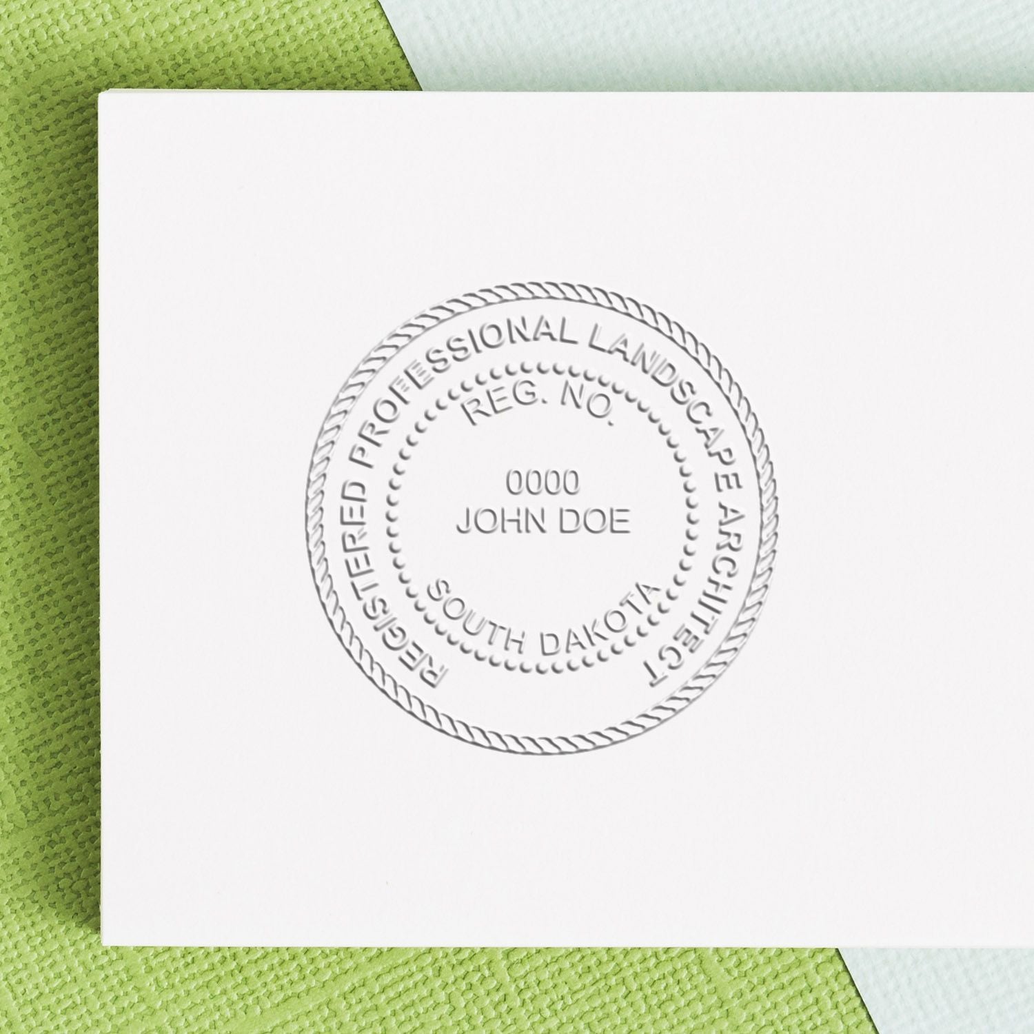 A photograph of the State of South Dakota Extended Long Reach Landscape Architect Seal Embosser stamp impression reveals a vivid, professional image of the on paper.