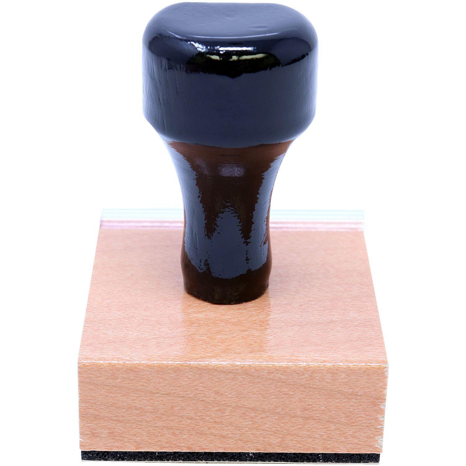 Real Estate Appraiser Regular Rubber Stamp of Seal with a black handle and wooden base, shown from the back view on a white background.