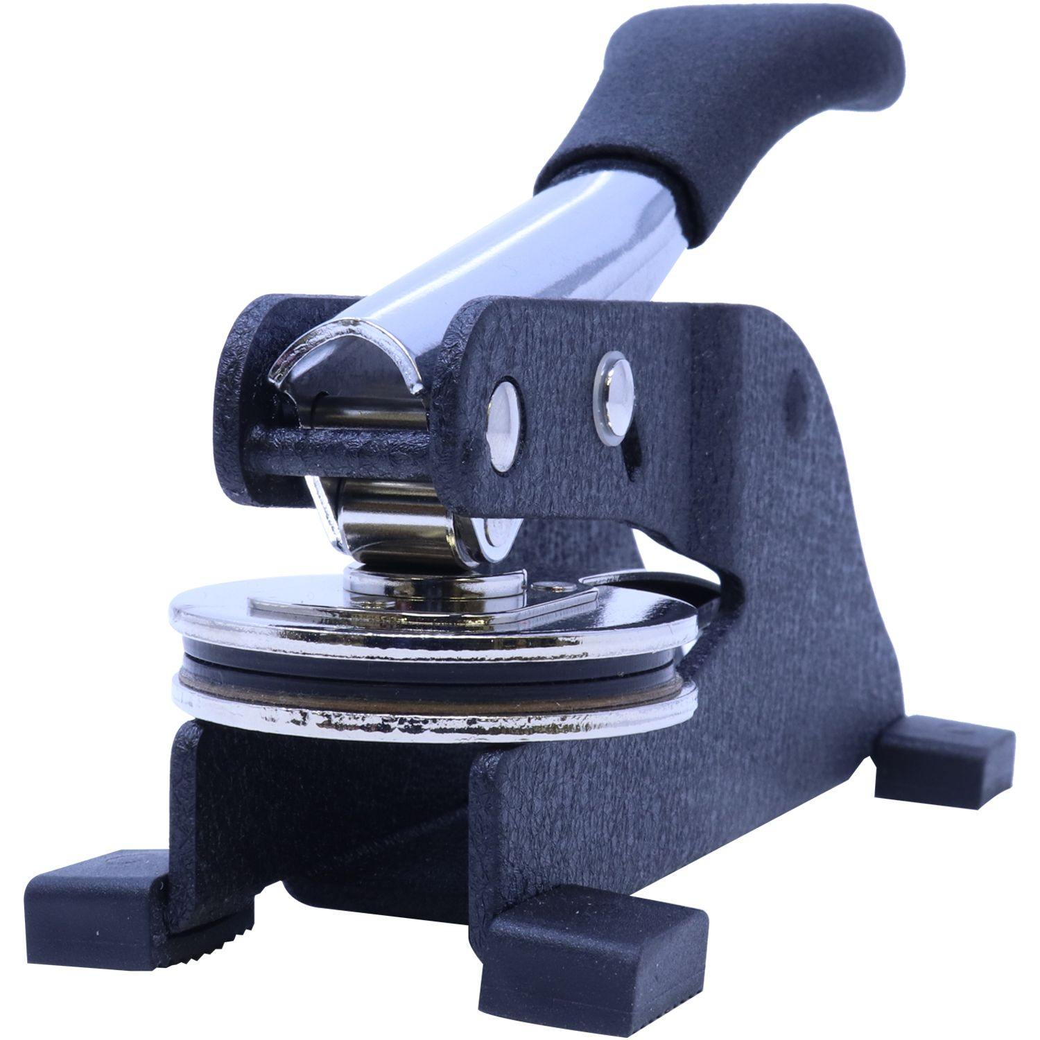 Real Estate Appraiser Desk Seal Embosser with a black handle and metal components, designed for imprinting seals on documents.