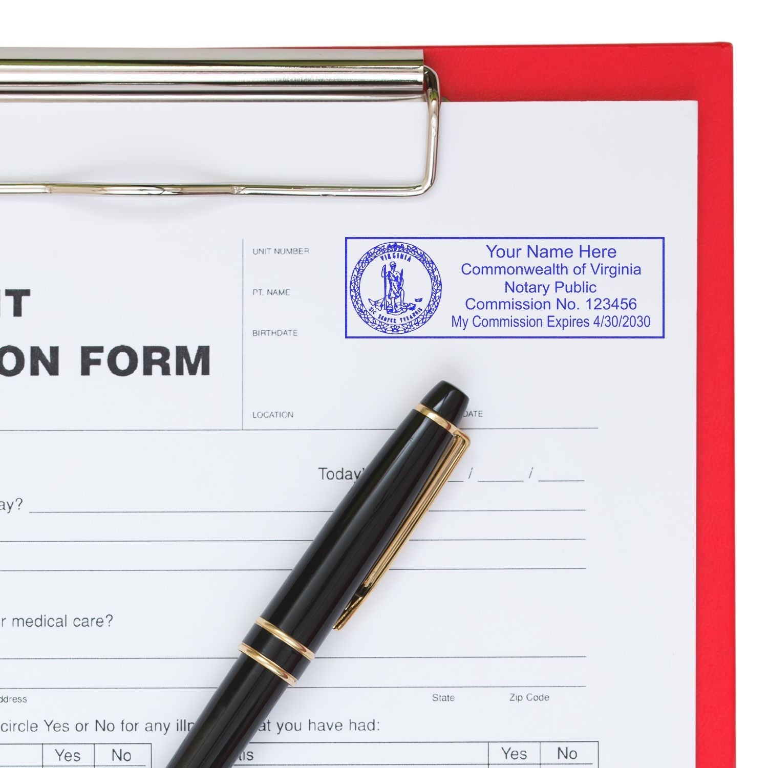 A Self Inking State Seal Notary Stamp imprint on a document, next to a pen and clipboard.