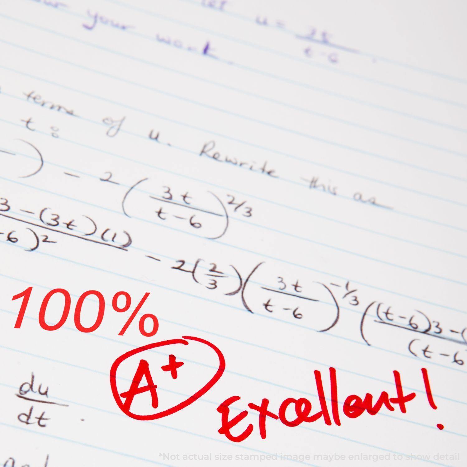 A math assignment with handwritten equations is stamped with 100% A+ Excellent! using the Large Pre-Inked 100% Stamp in red ink.