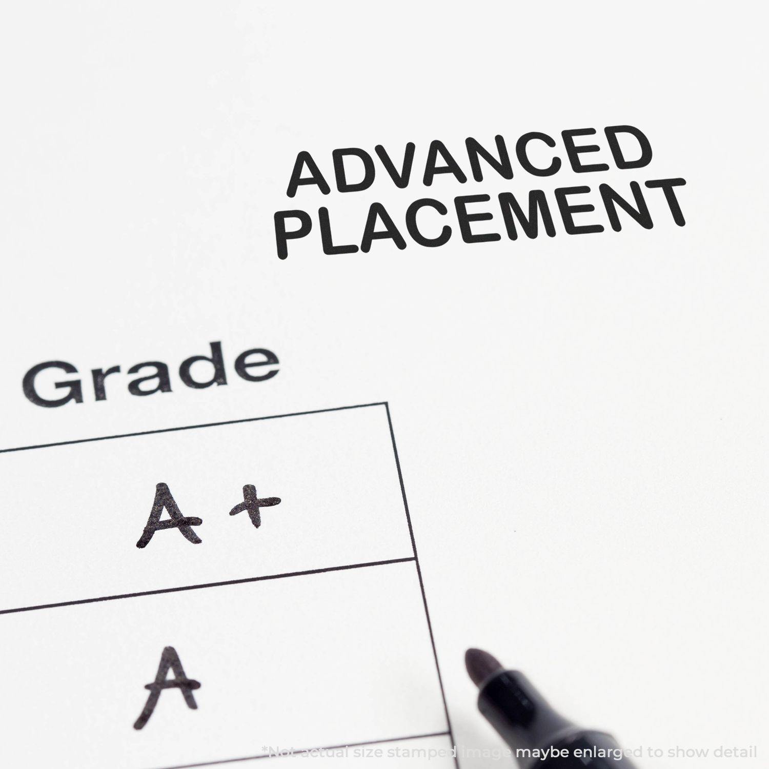 Large Pre-Inked Advanced Placement Stamp marking ADVANCED PLACEMENT on paper with handwritten grades A+ and A below.