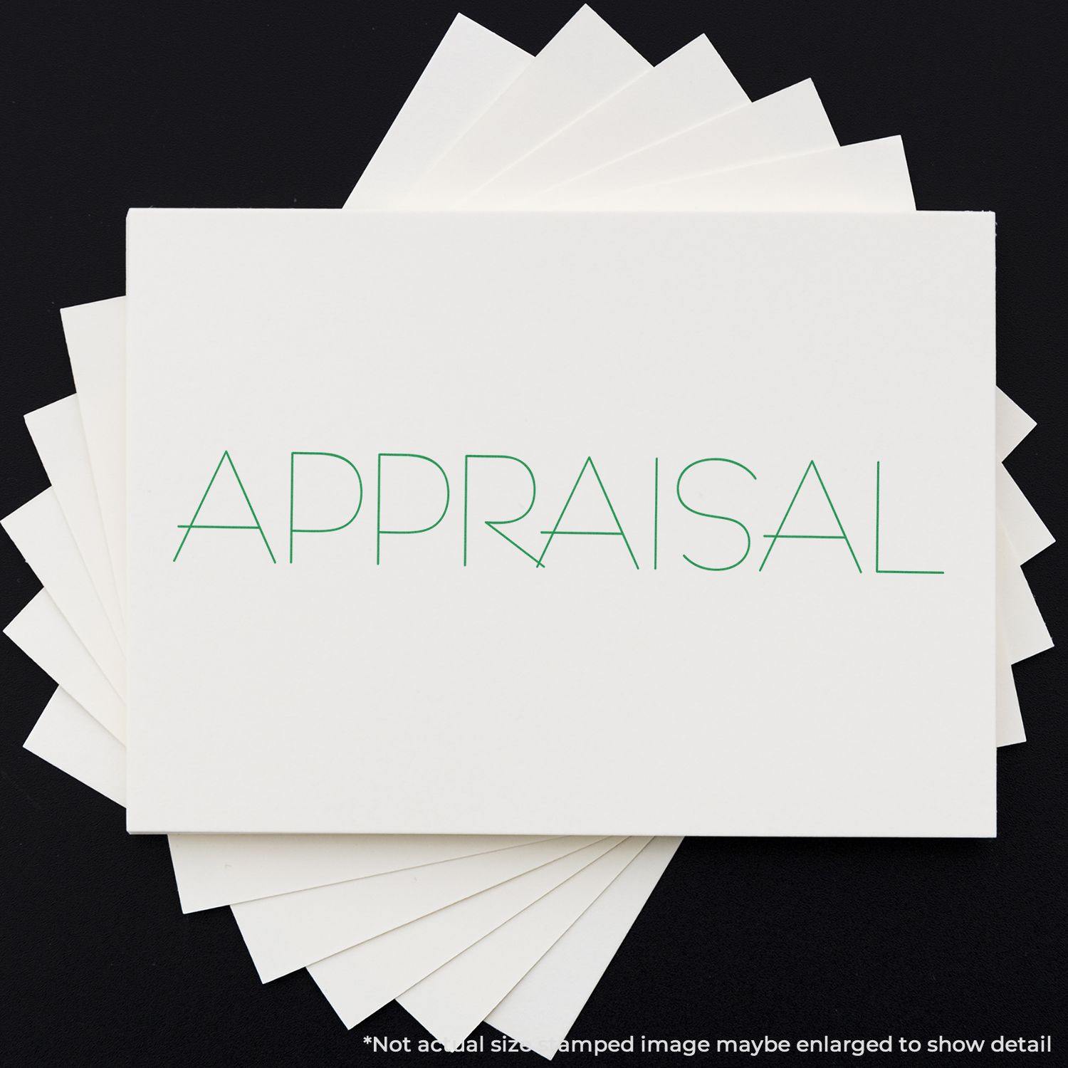 Self Inking Appraisal Stamp used on a stack of white cards with the word APPRAISAL stamped in green ink.