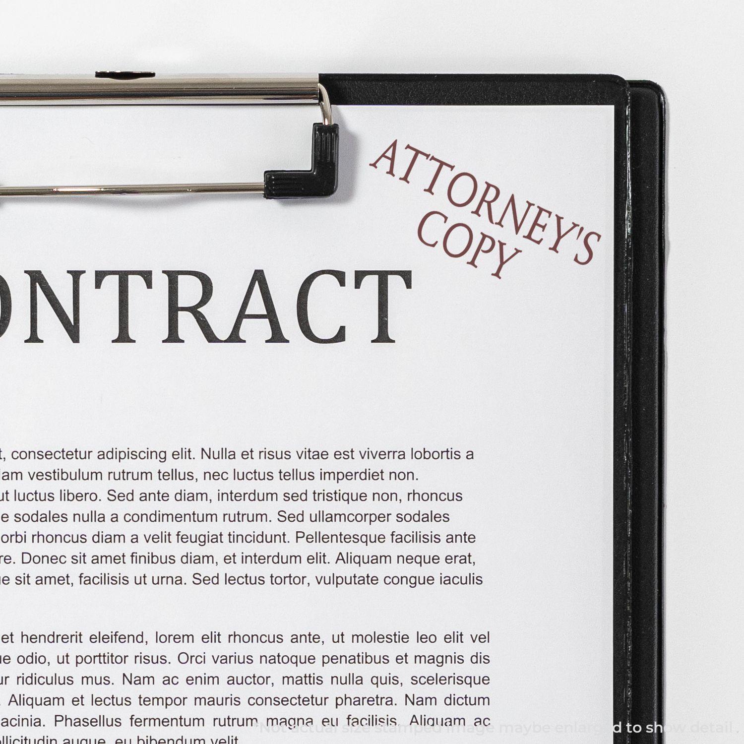 Contract document with an 'Attorney's Copy' rubber stamp in red ink on the top right corner, clipped to a clipboard.