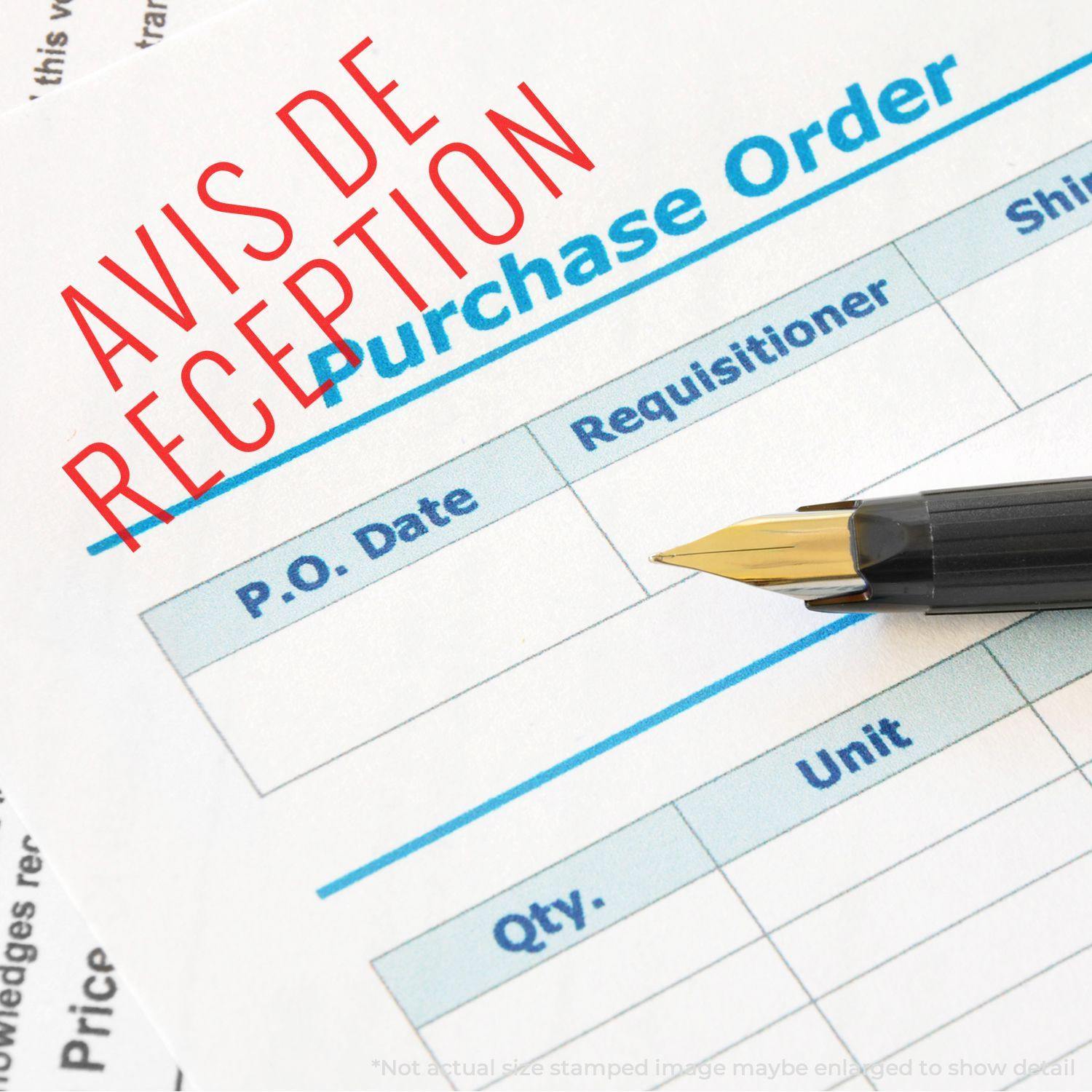 Large Self Inking Avis De Reception Stamp marking a purchase order form with a pen placed on the form.