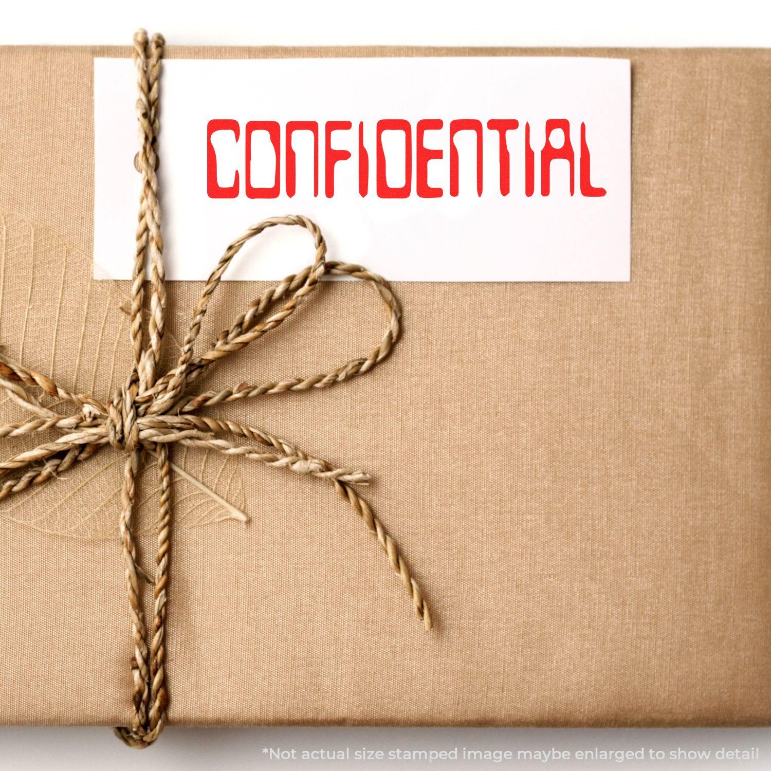 A brown package tied with twine, featuring a white card stamped with CONFIDENTIAL in red. Focus word: Barcode Confidential Rubber Stamp.