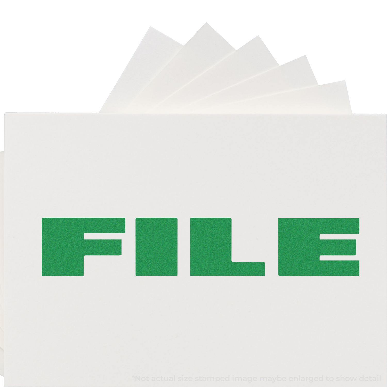 Bold Font File Rubber Stamp in green ink on white paper with the word FILE prominently displayed.