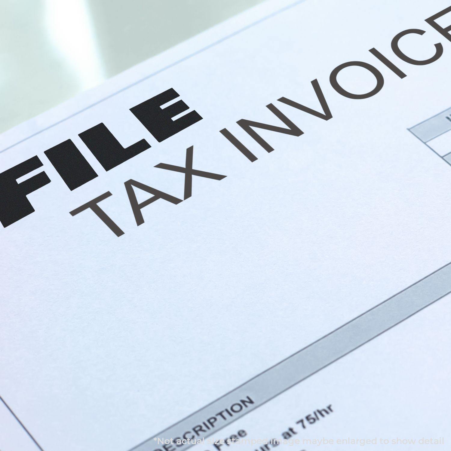 Large Self Inking Bold Font File Stamp marking "FILE" on a tax invoice document.