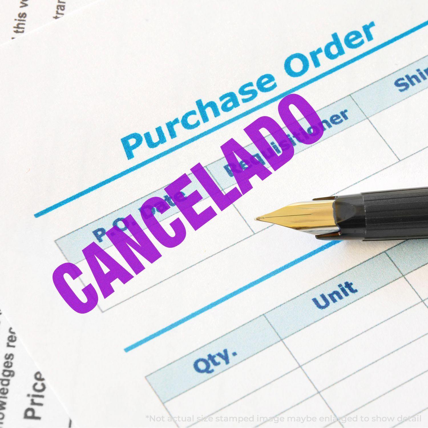 Large Self Inking Cancelado Stamp in purple ink on a purchase order document, with a pen placed beside the stamped text.