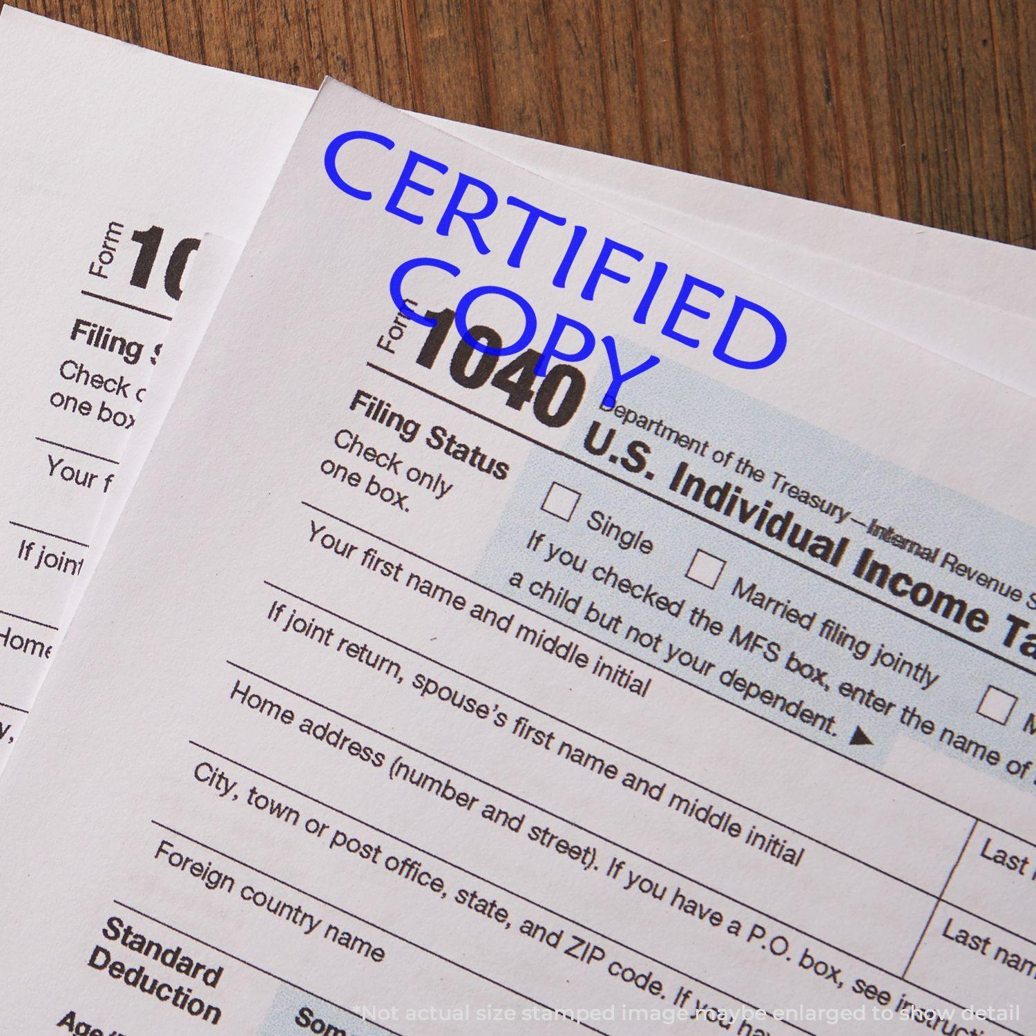 Large Pre-Inked Certified Copy Stamp marking CERTIFIED COPY in blue ink on a U.S. Individual Income Tax Return form.