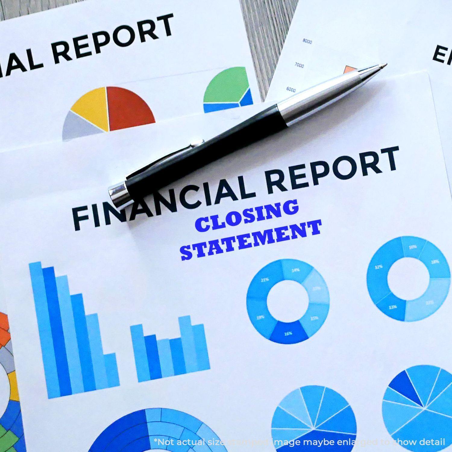 Large Pre-Inked Closing Statement Stamp used on a financial report with charts and a pen on top.