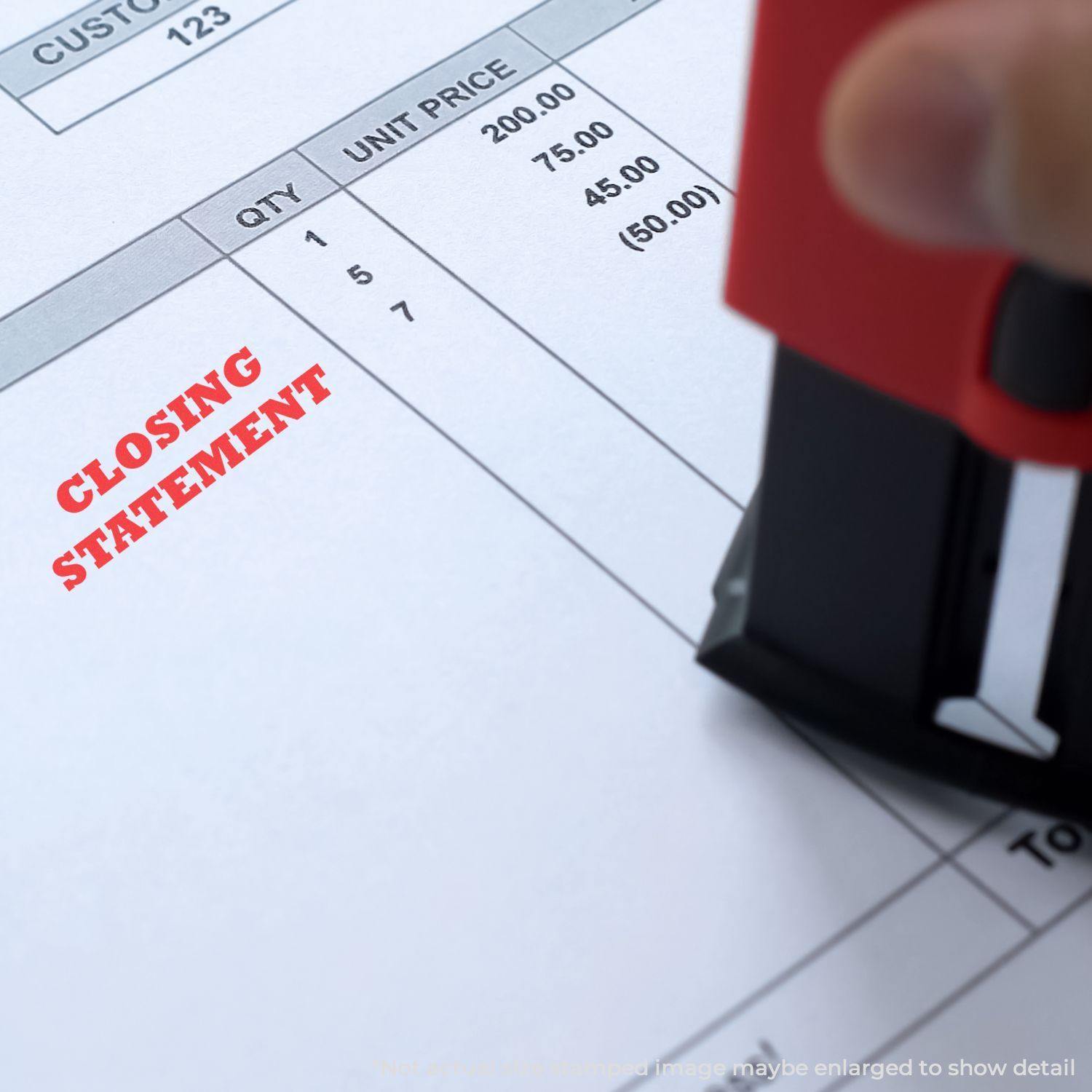 A Self Inking Closing Statement Stamp is being used on a document, marking CLOSING STATEMENT in red ink on a table of itemized prices.