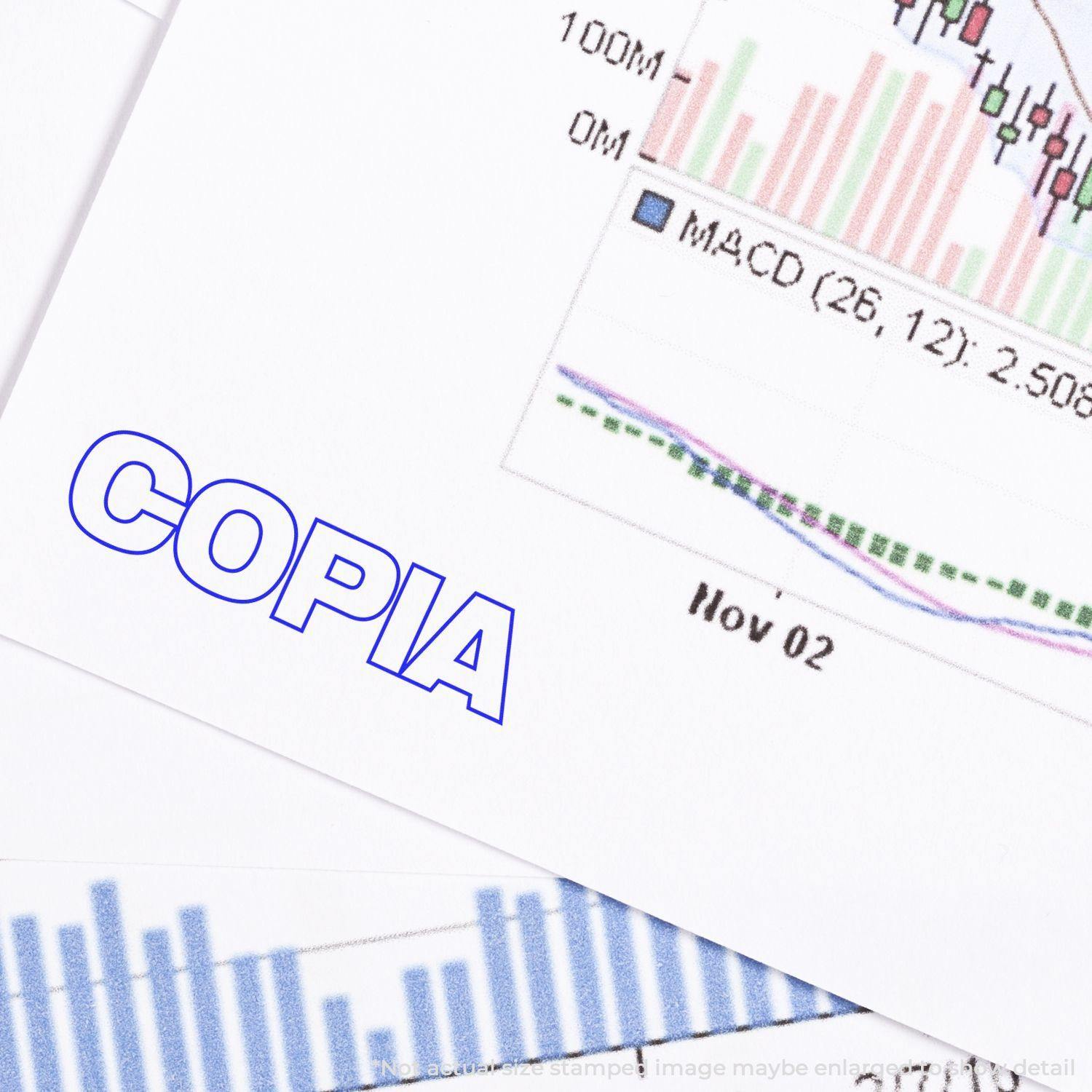 Close-up of a document stamped with COPIA in blue ink using the Copia Rubber Stamp, featuring financial graphs and data in the background.