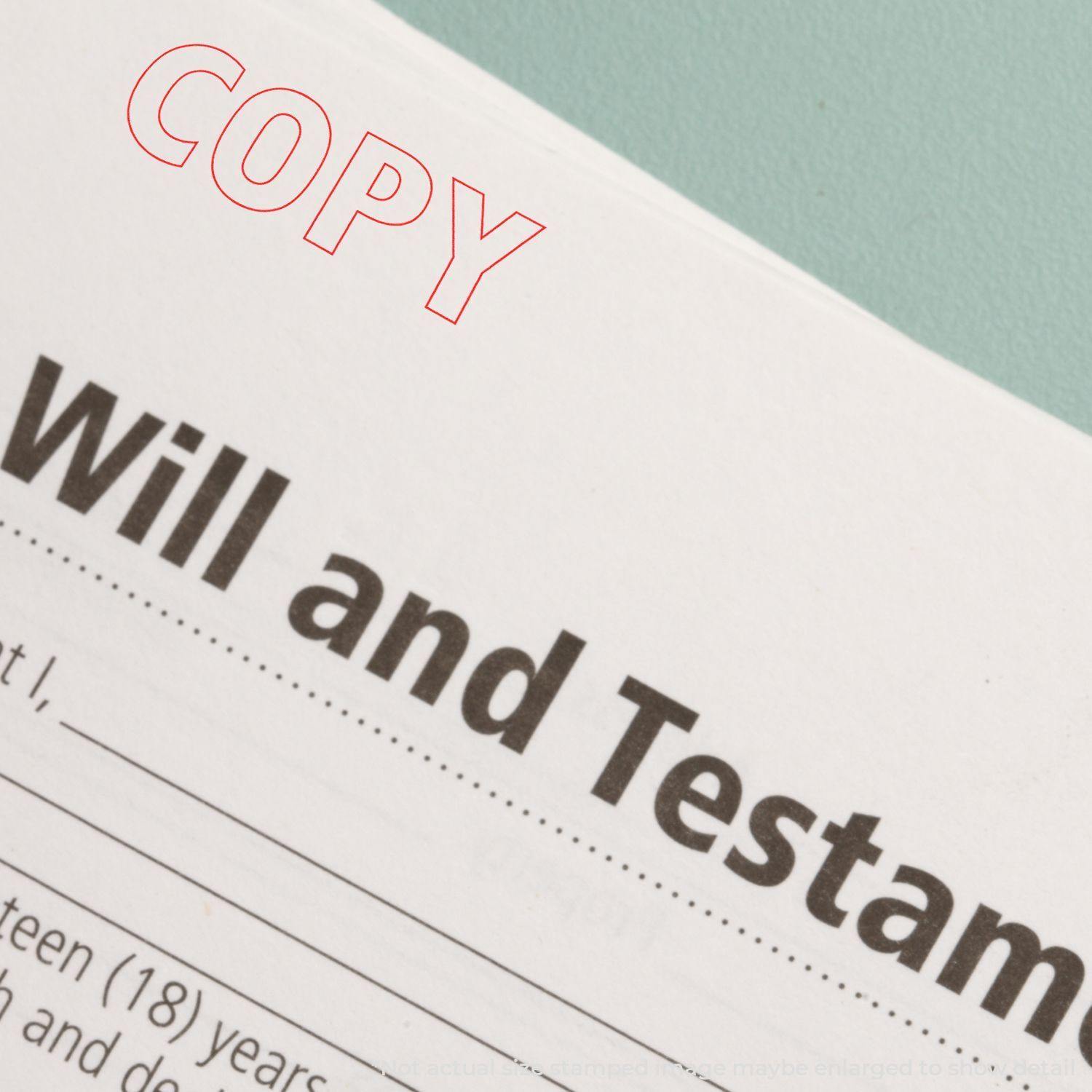 Copy Outline Text Rubber Stamp marking COPY in red on a document titled Will and Testament against a light green background.