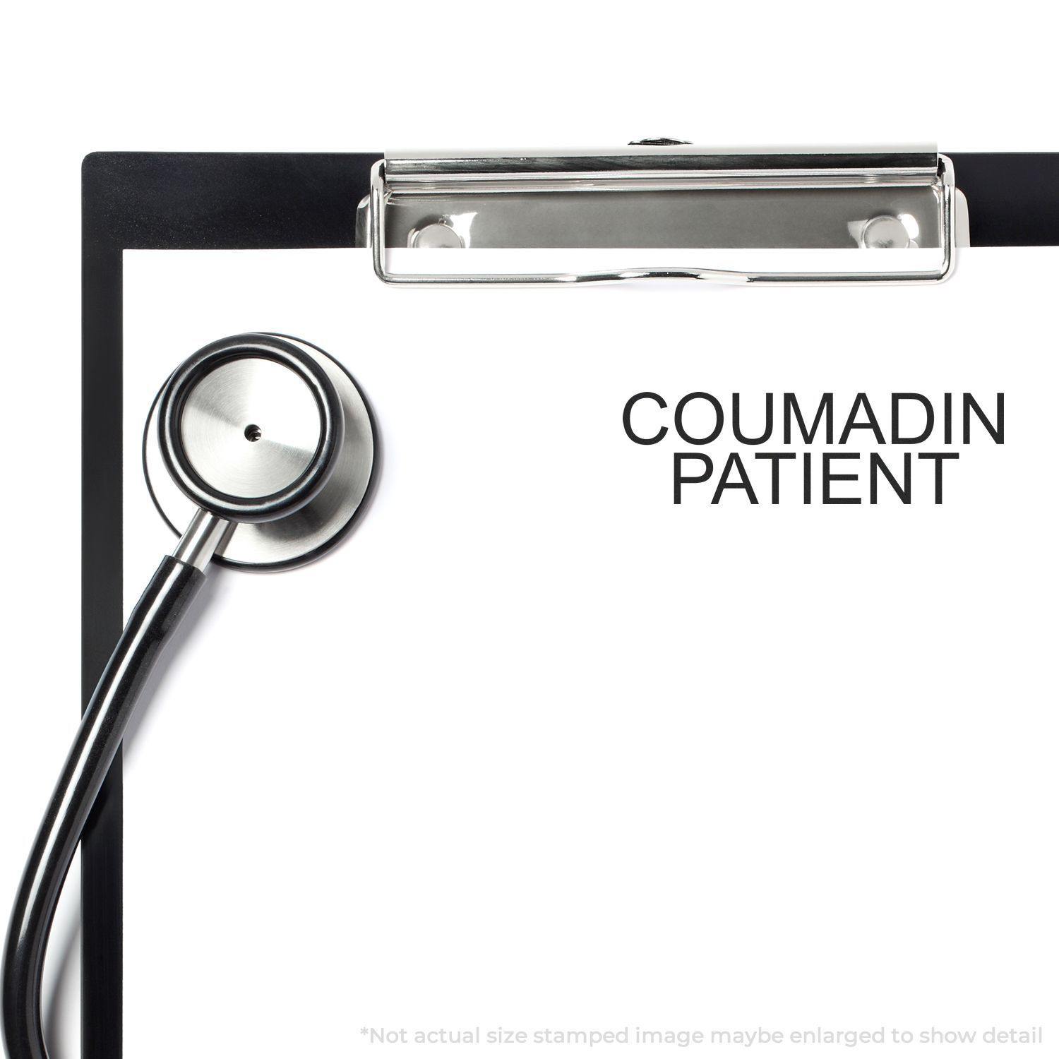 Clipboard with stethoscope and COUMADIN PATIENT stamped using the Self Inking Coumadin Patient Stamp.