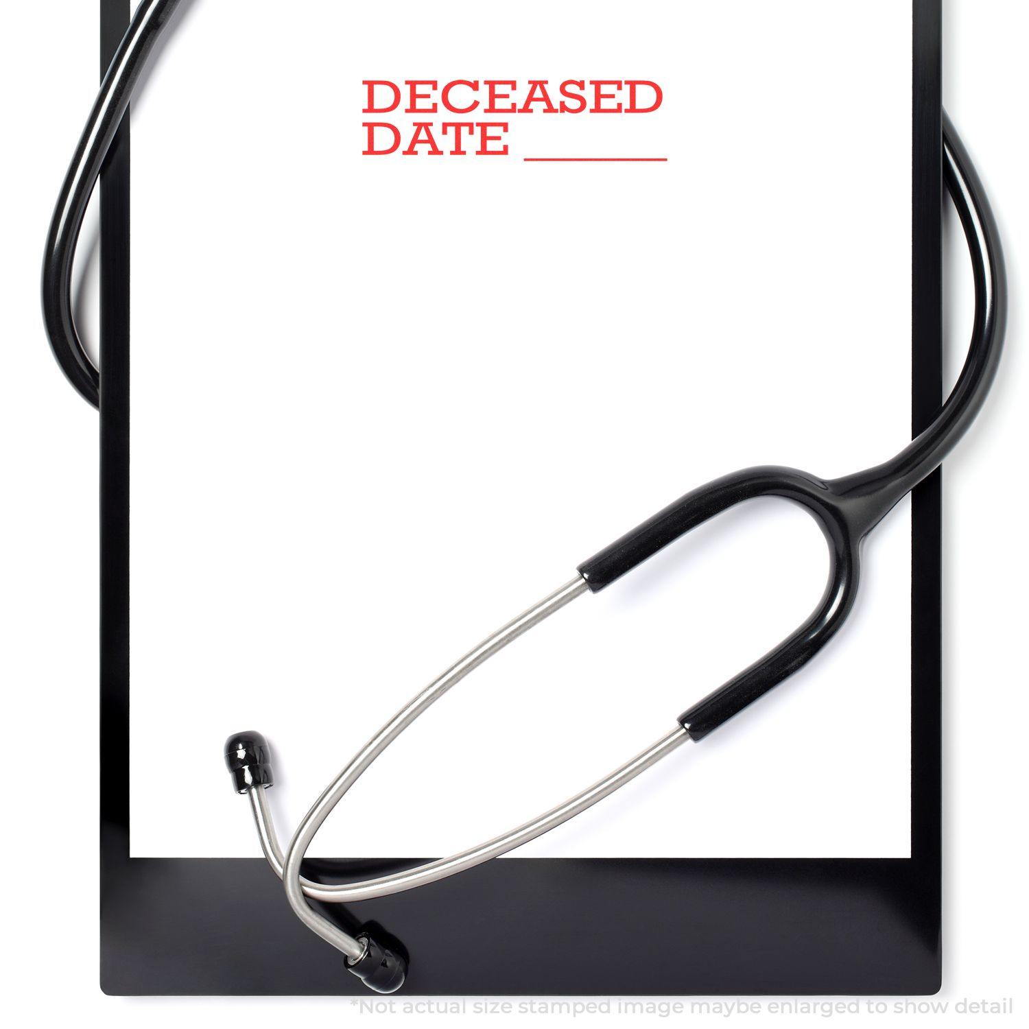 Slim Pre-Inked Deceased Date Stamp on a clipboard with a stethoscope, highlighting the stamped text DECEASED DATE in red.