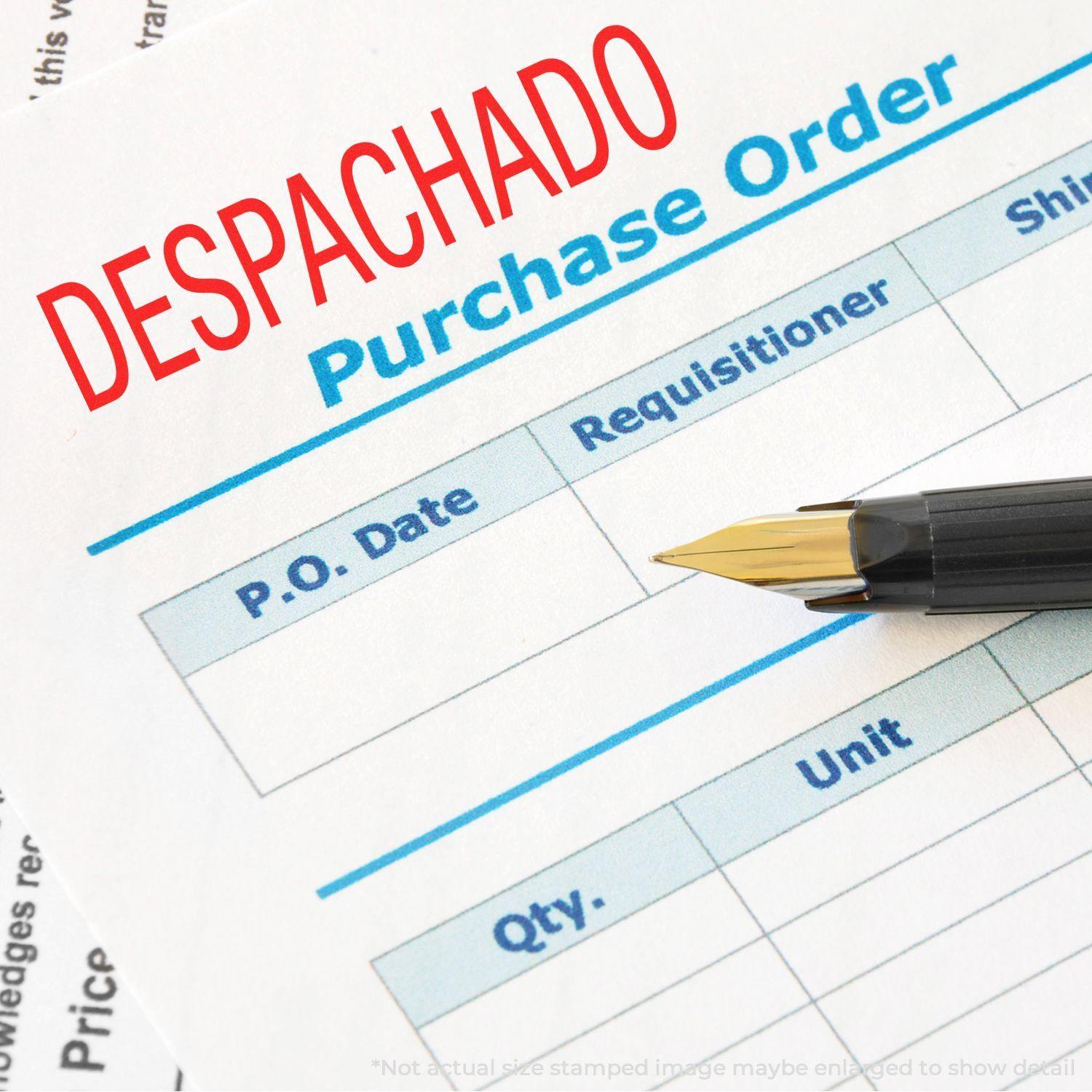 Despachado Rubber Stamp marking a purchase order document with a fountain pen placed nearby.