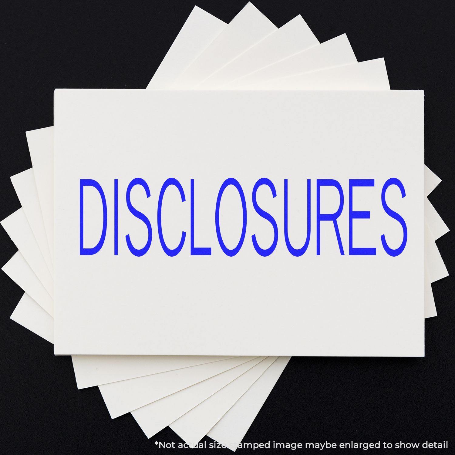 Large Disclosures Rubber Stamp in blue ink on white paper, with multiple sheets fanned out underneath.