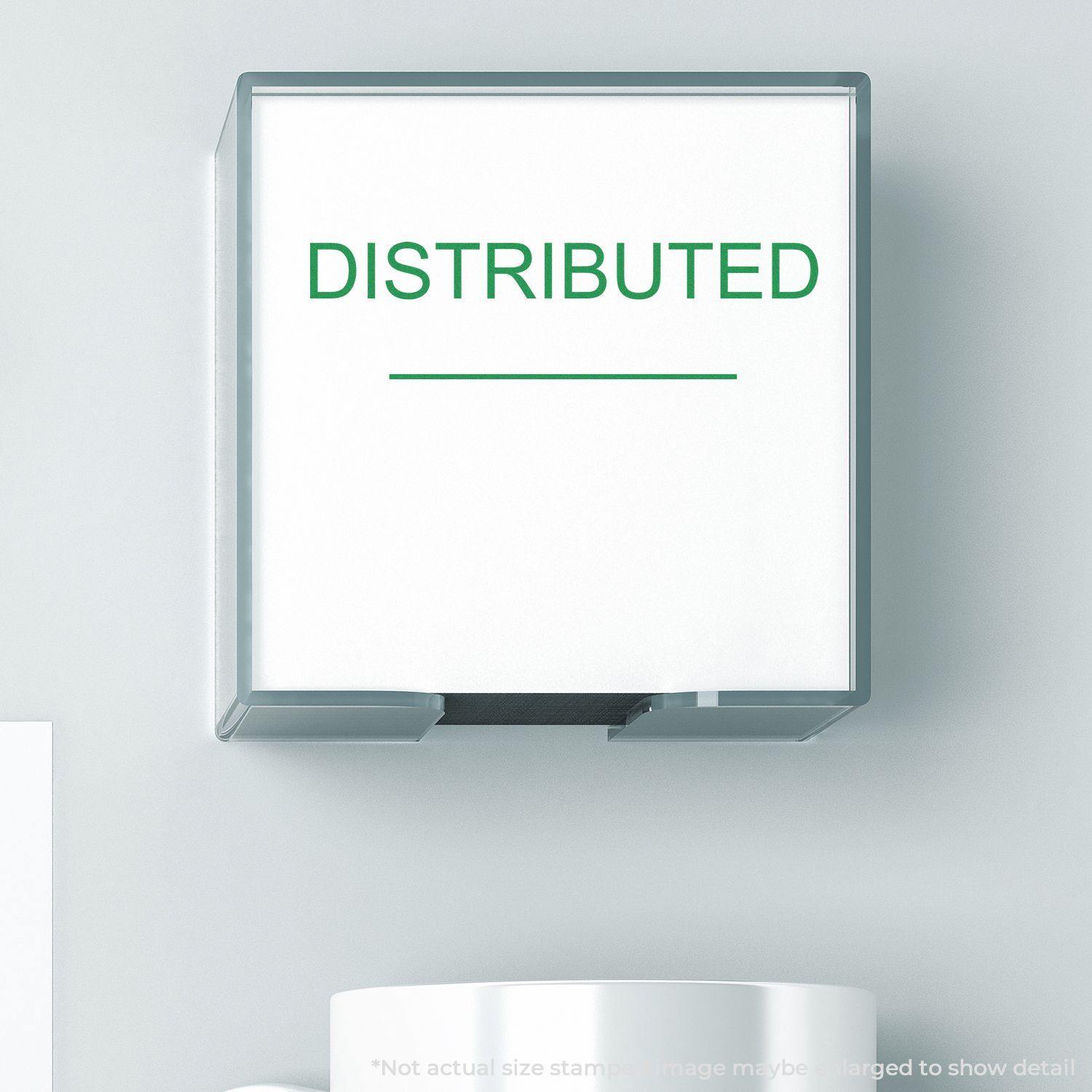 Large Self Inking Distributed Stamp With Line in green ink, shown in use on a white surface.