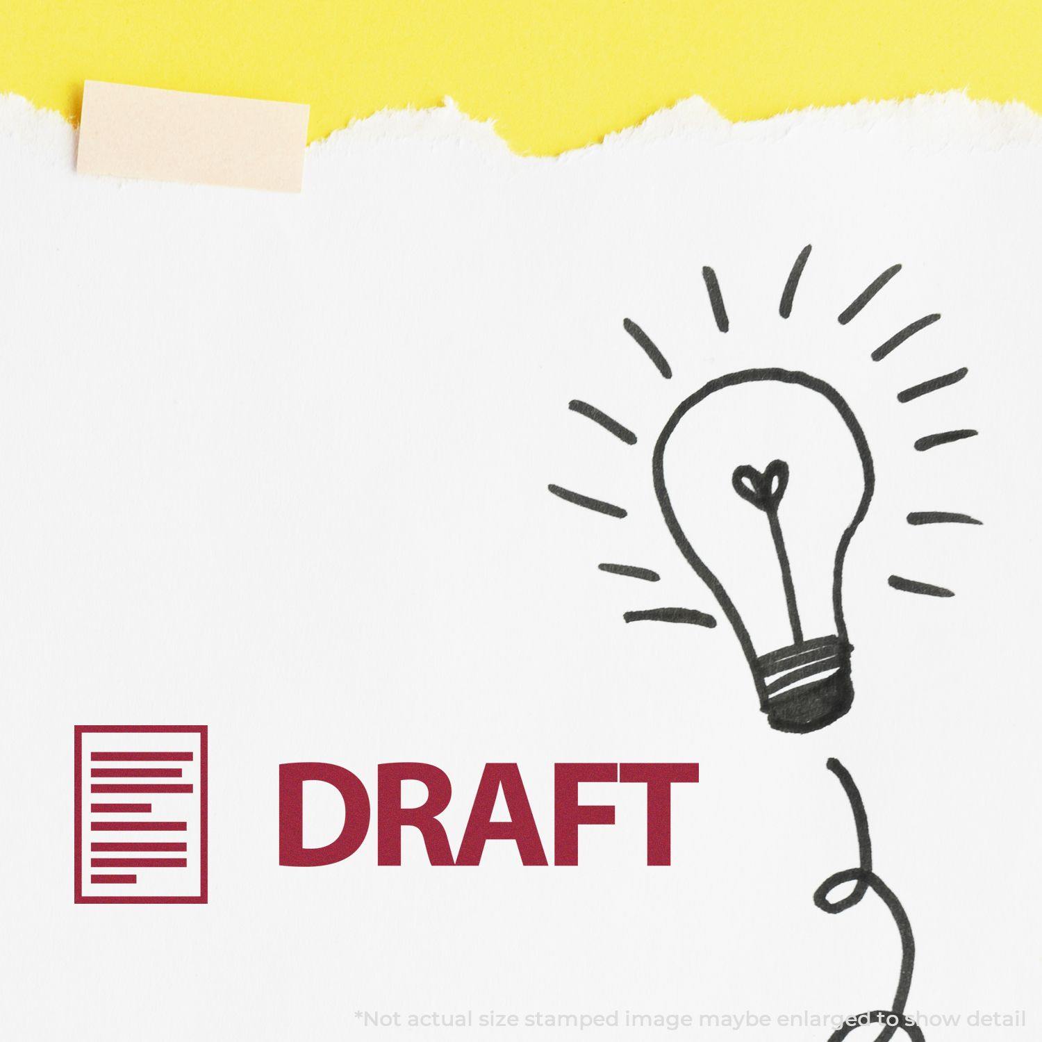 Large Self Inking Draft with Letter Stamp used on white paper with a lightbulb drawing and the word DRAFT in bold red letters.