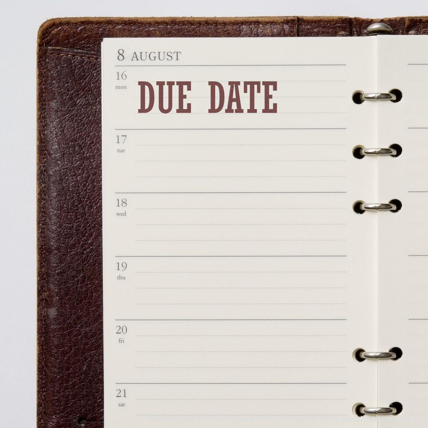 Open planner with DUE DATE stamped in red on August 16 using the Due Date Rubber Stamp.