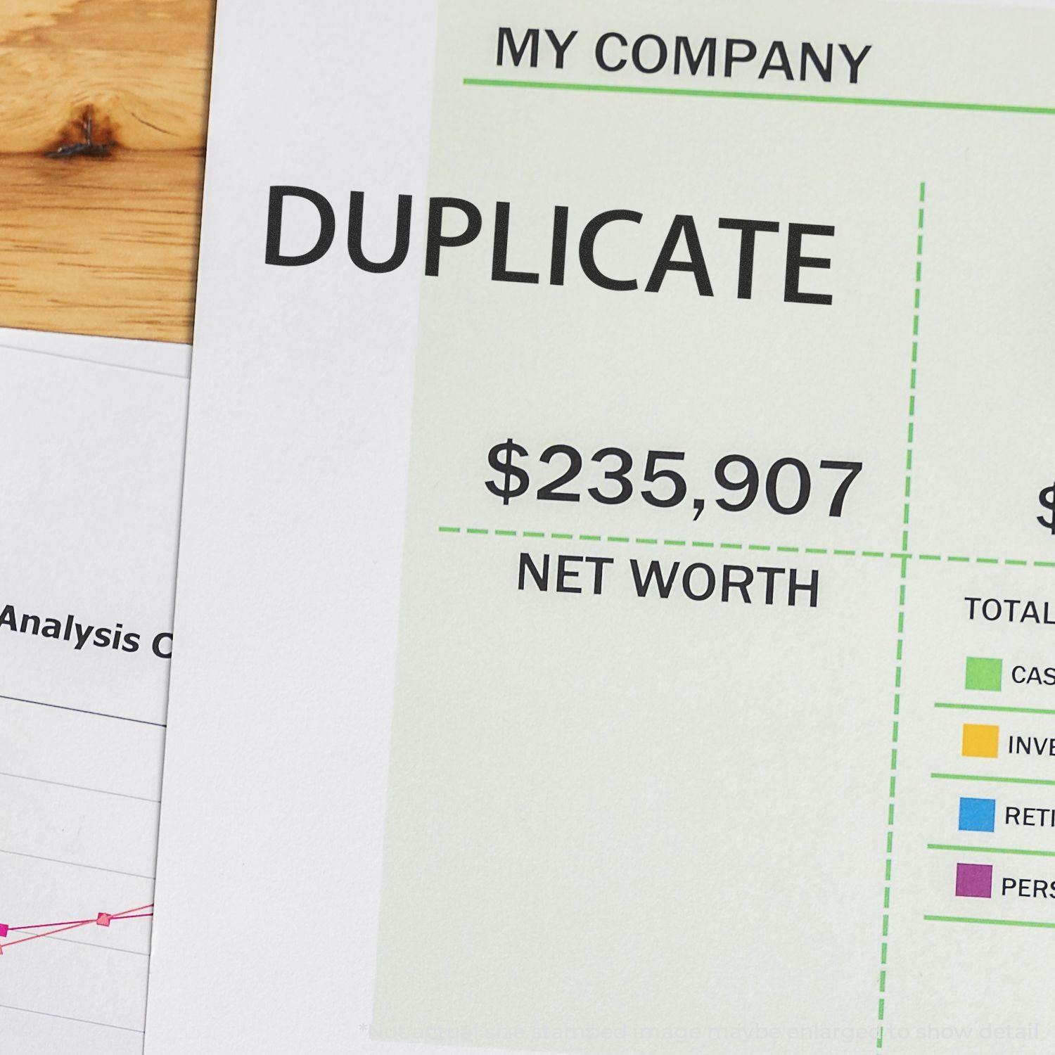 A document stamped with DUPLICATE using the Large Pre-Inked Duplicate Stamp, showing financial details and a net worth of $235,907.