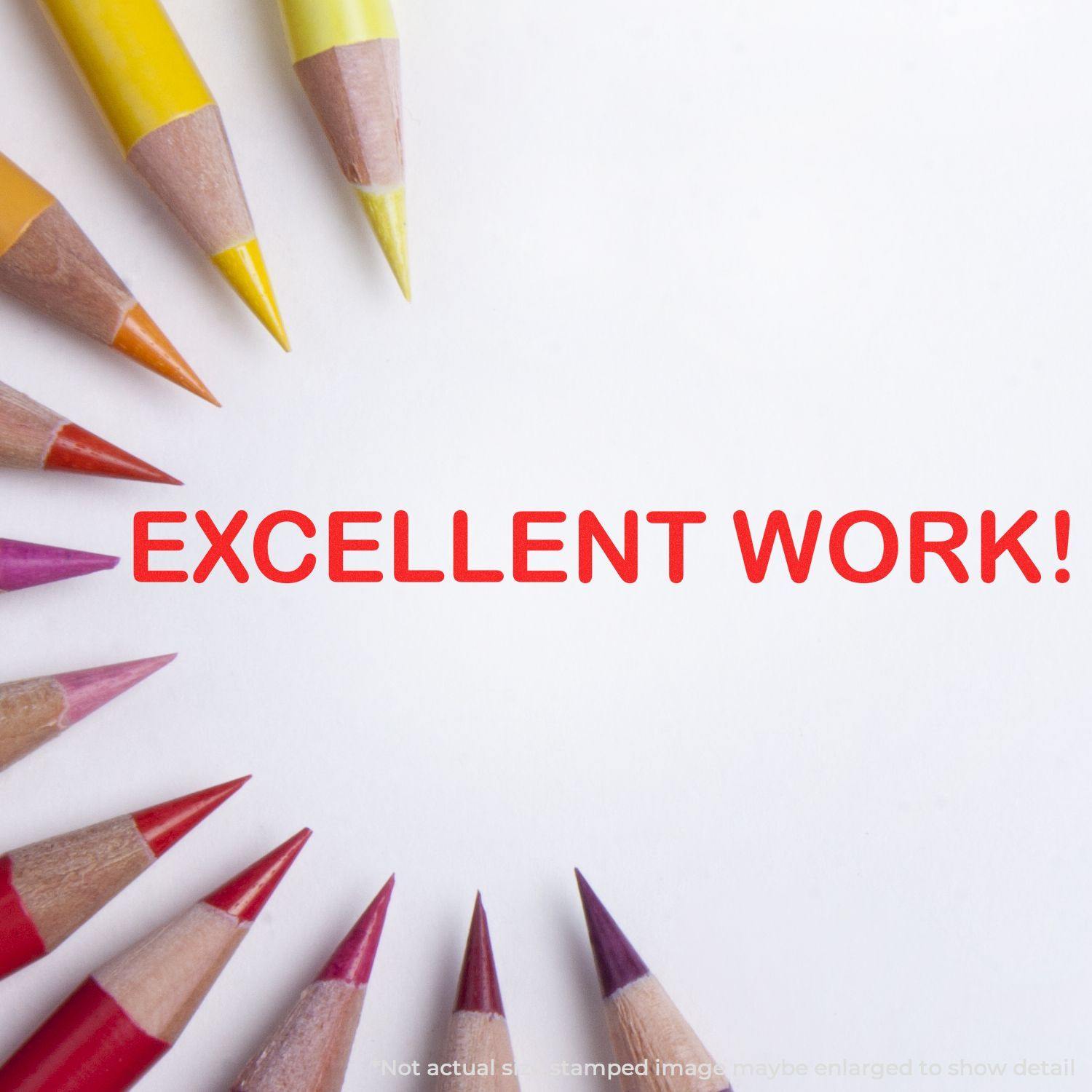 Colorful pencils encircle a red 'EXCELLENT WORK!' stamped with the Large Self Inking Excellent Work Stamp on white paper.