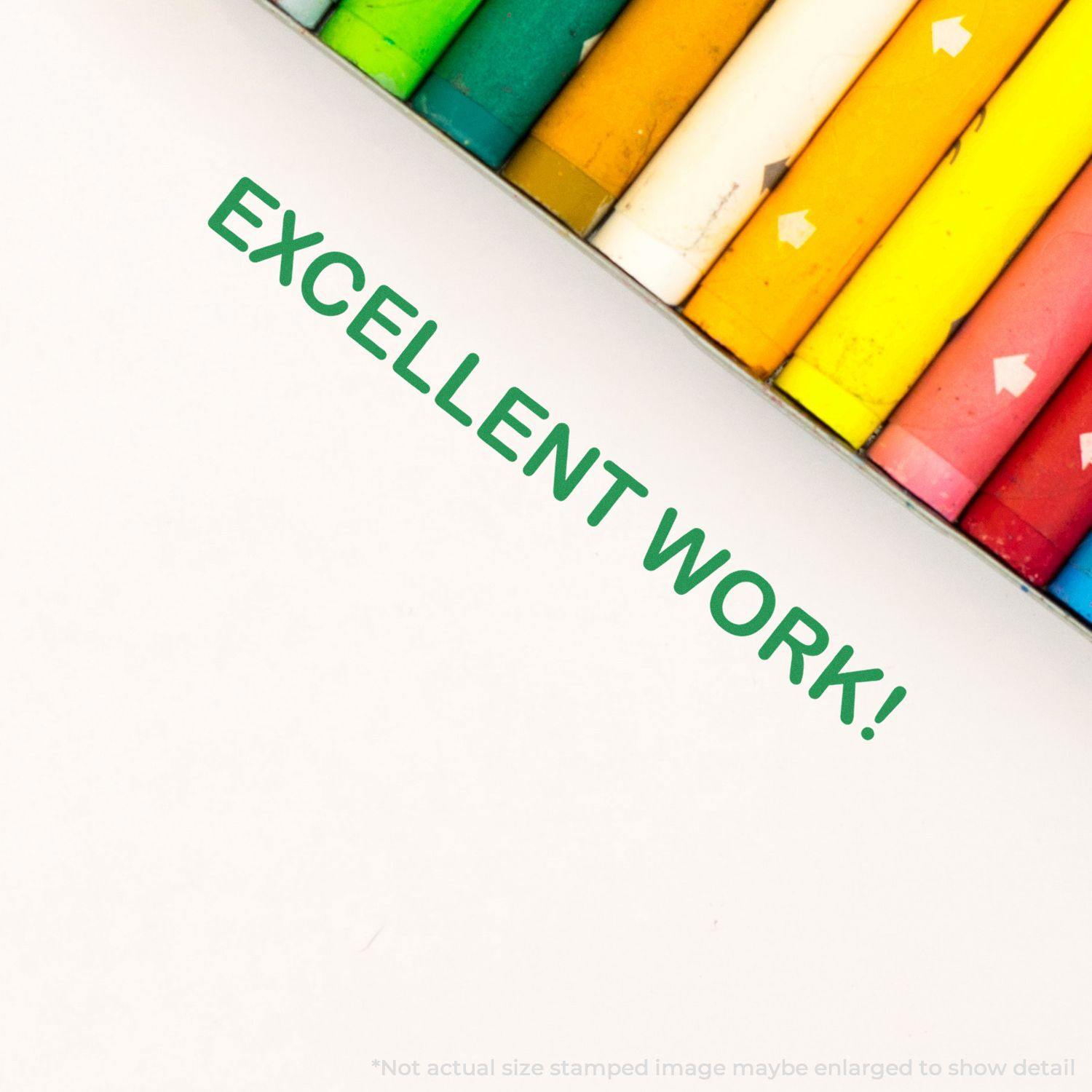 Large Self Inking Excellent Work Stamp imprint on paper with colorful crayons on the side, showing the message 'EXCELLENT WORK!' in green ink.